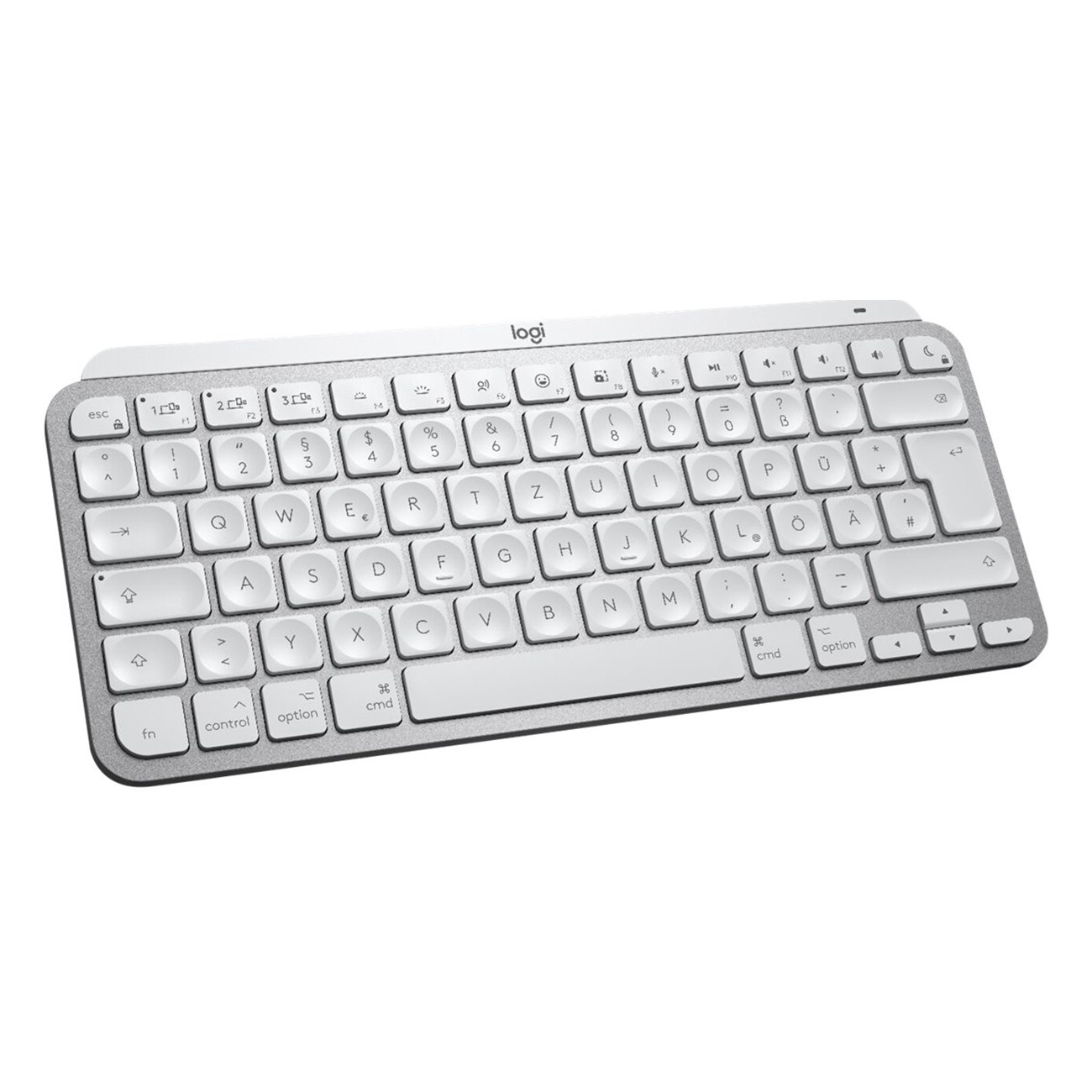 Srebrna klawiatura z białymi klawiszami. Widoczna nazwa marki 'logi'. Białe tło.