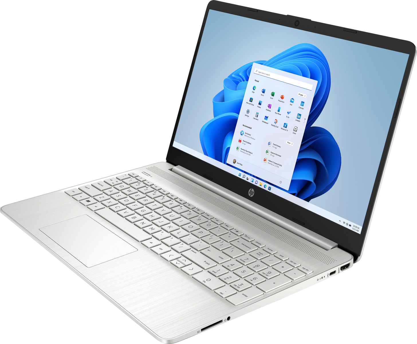 Laptop plateado abierto, en ángulo. Pantalla muestra interfaz Windows 11 con iconos.