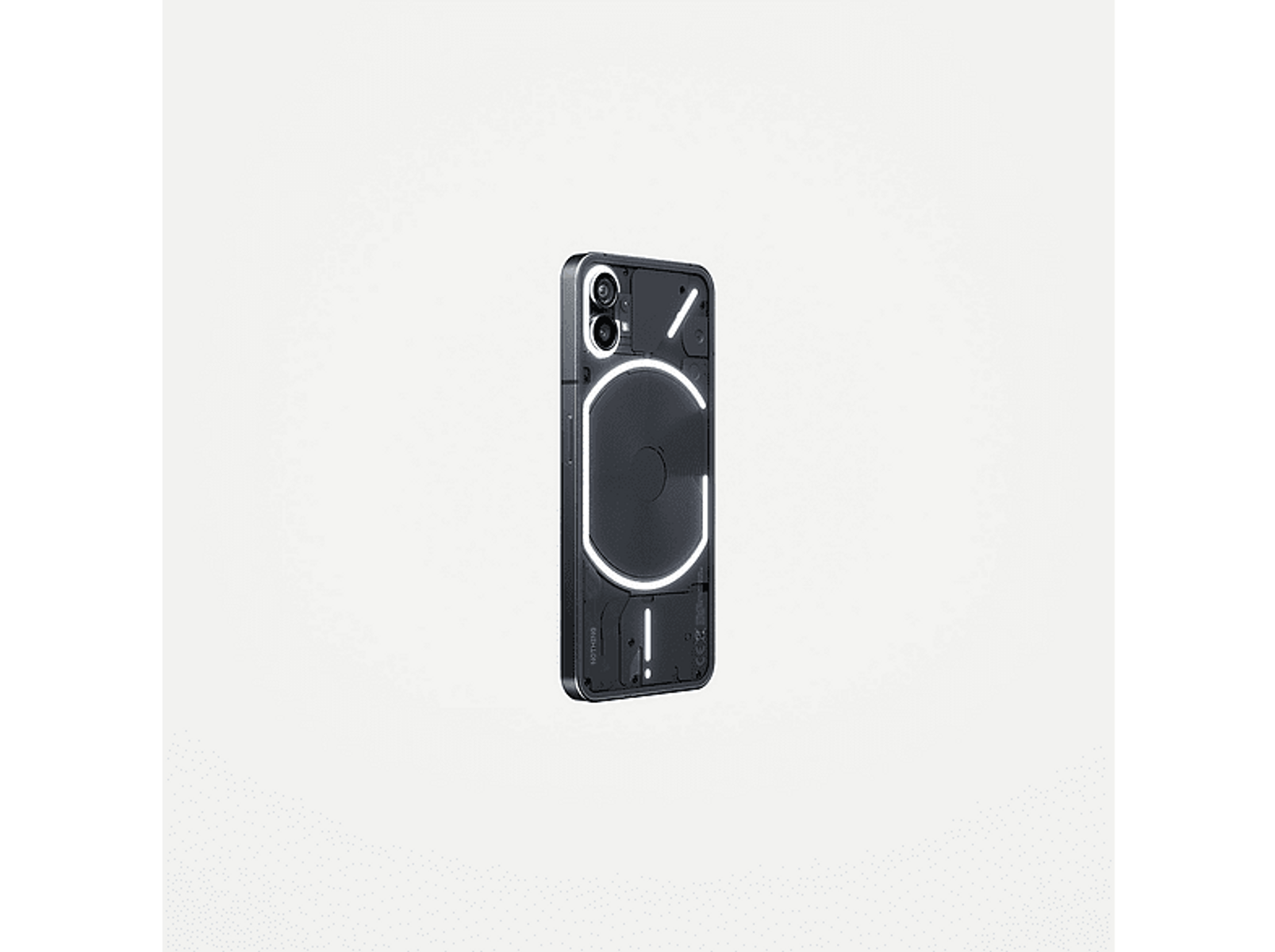 Un Nothing Phone (1) negro sobre fondo blanco. La parte trasera tiene un diseño único.