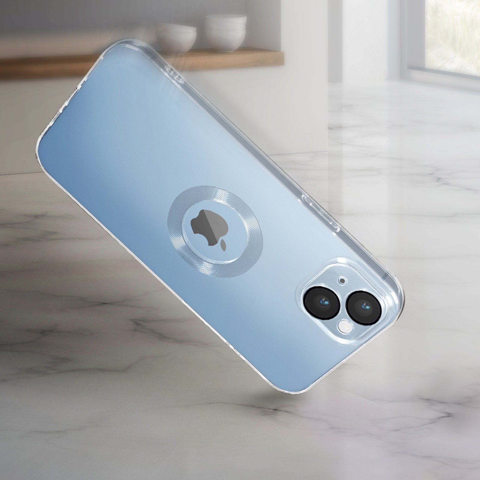 Una custodia trasparente per telefono con il logo Apple su una superficie in marmo, con vista finestra.