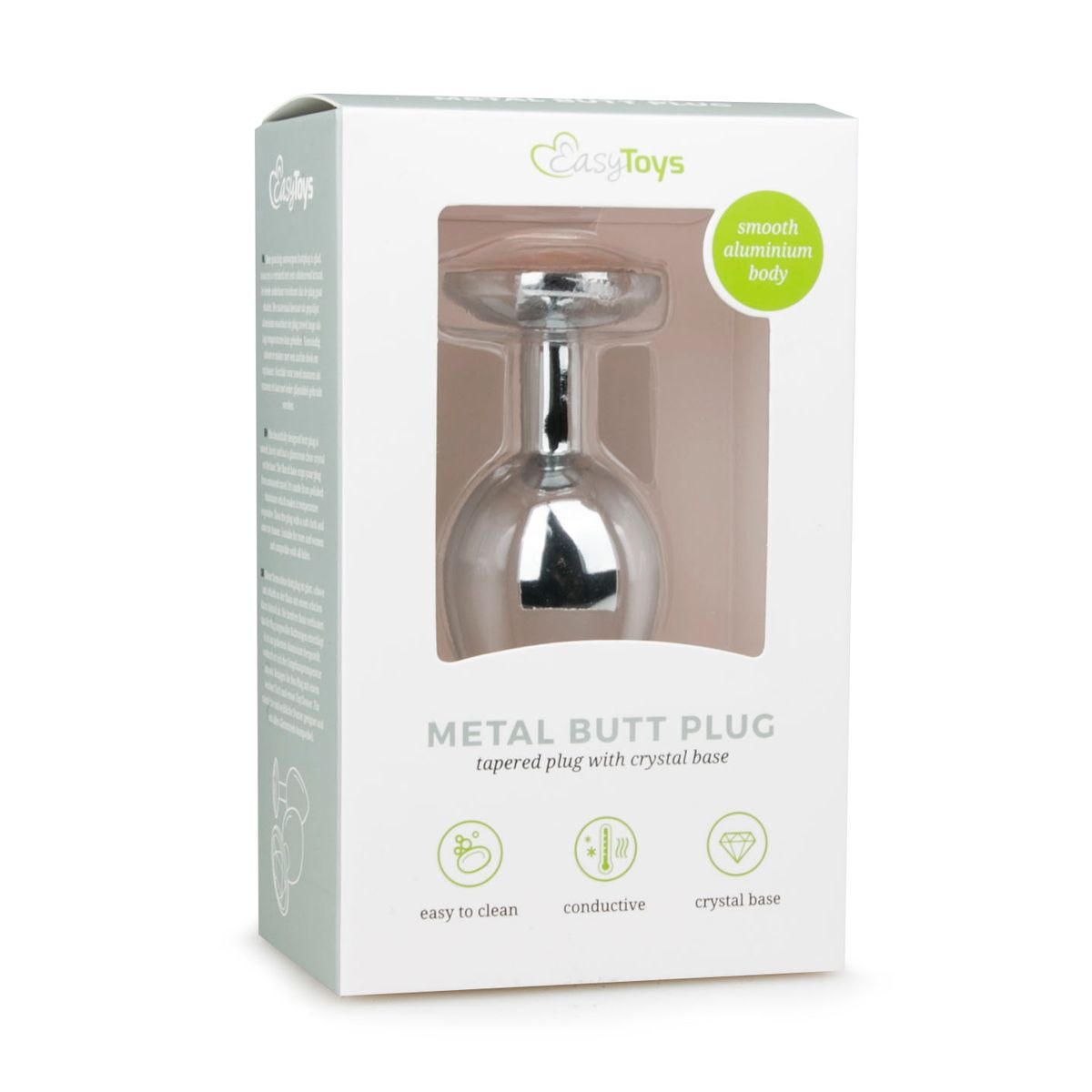 Ein Metall-Butt-Plug in einer weißen Box. Der Plug hat eine Kristallbasis und einen glatten Aluminiumkörper. Die Box hat Text und Symbole.