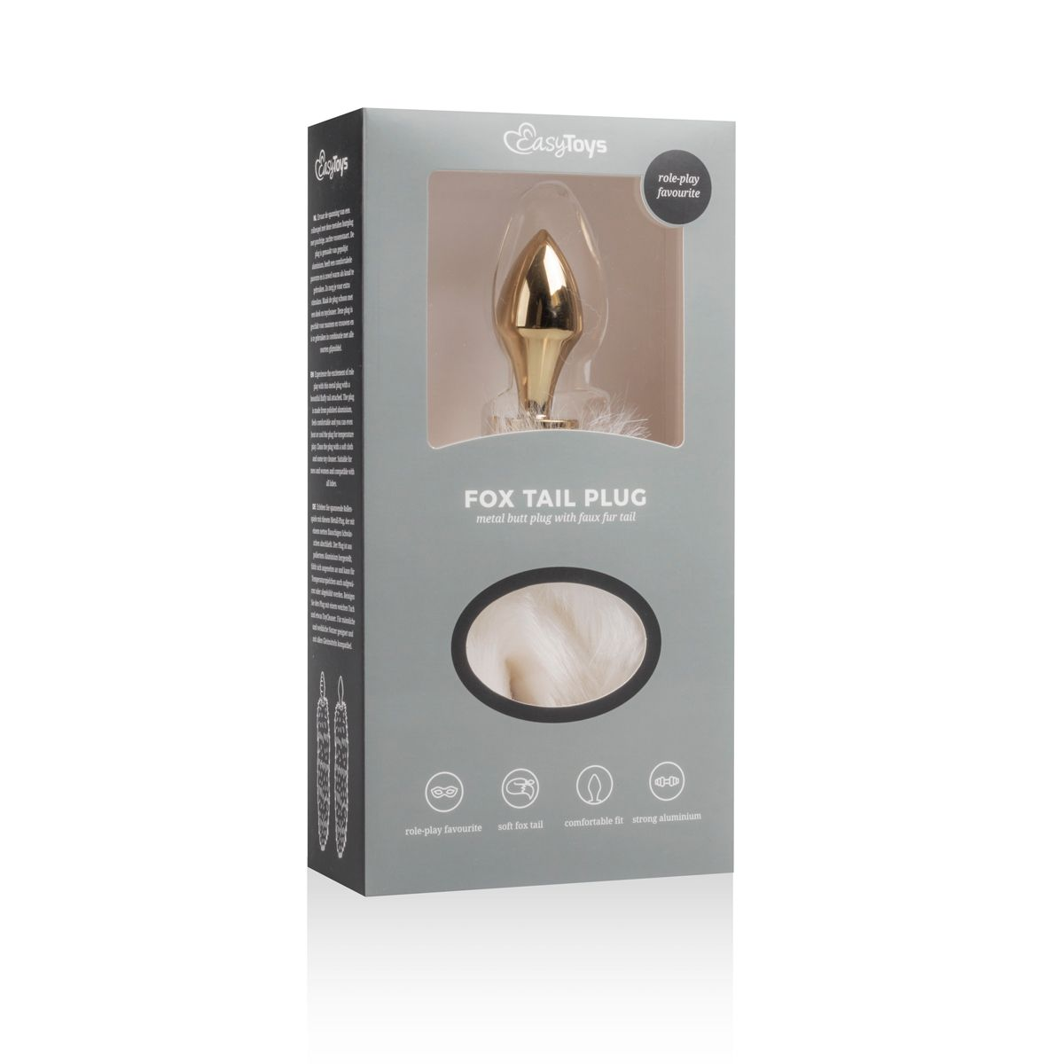 Box mit goldenem Analplug mit Kunstpelzschwanz. Rollenspiel steht auf der Box.