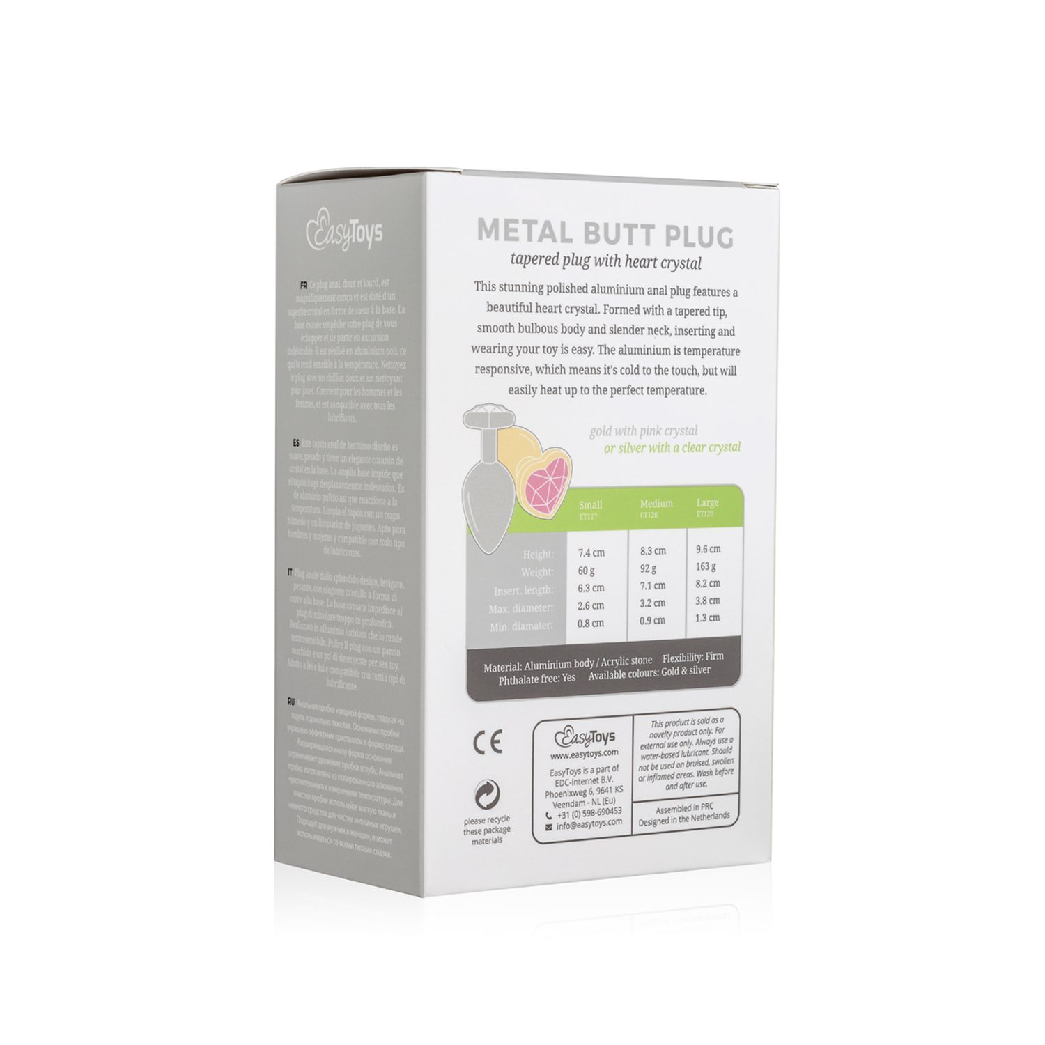 Caja de producto con texto e imagen de un tapón anal de metal. El texto incluye detalles del producto y advertencias.