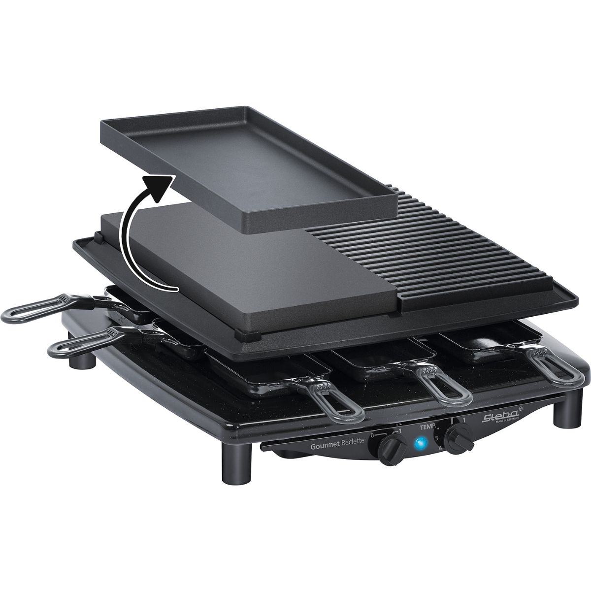 Ein Raclette-Grill mit drei Heizflächen und einzelnen Pfannen zum Schmelzen von Käse.