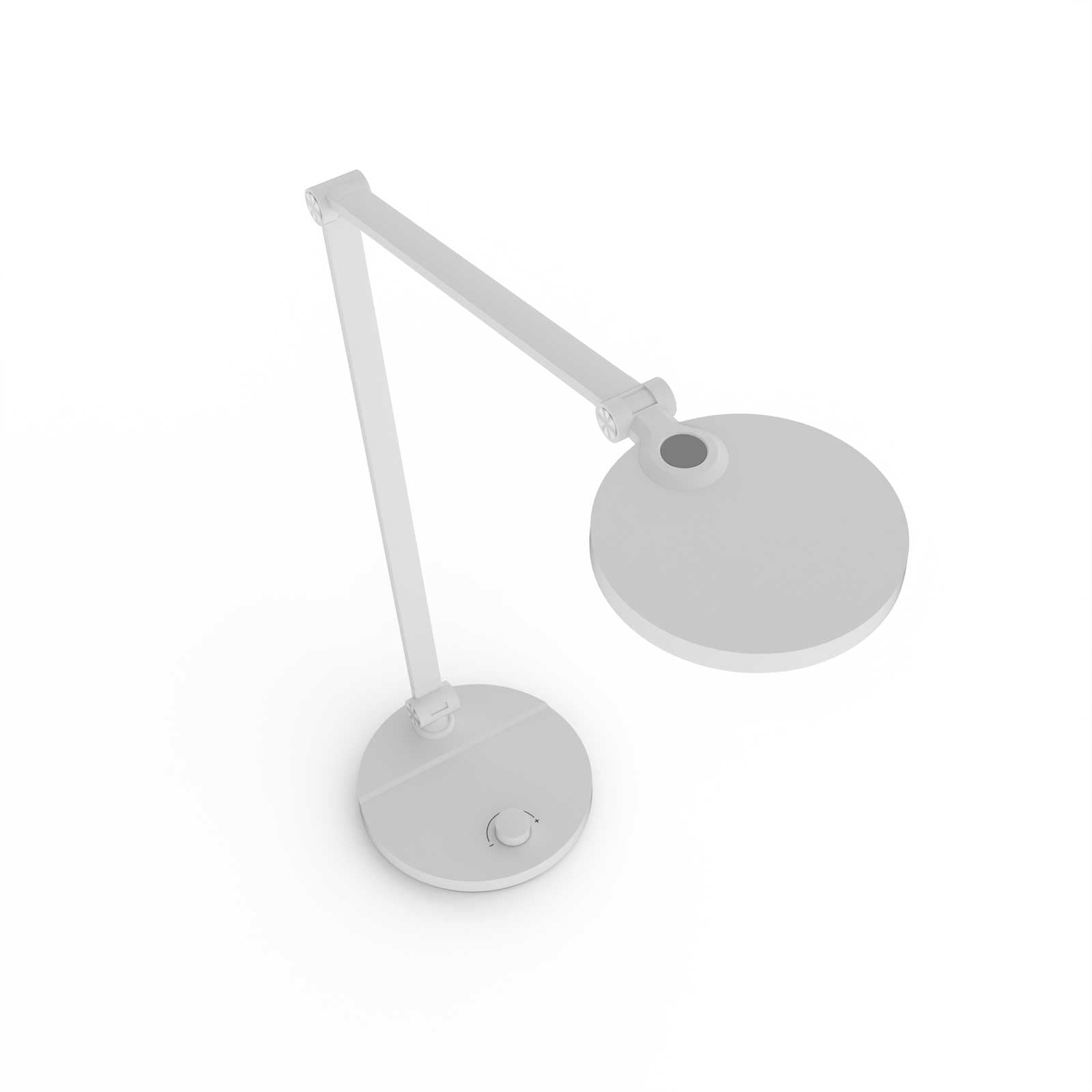 Weiße Schreibtischlampe, runder Kopf, verstellbarer Arm, auf weißer Oberfläche.