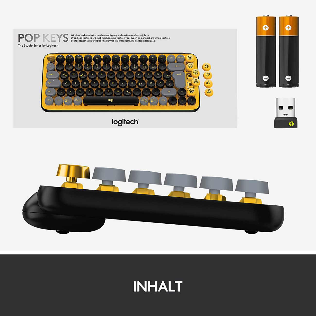 Eine gelb-schwarze Tastatur mit zusätzlichen Artikeln wie Batterien und einem USB-Empfänger.