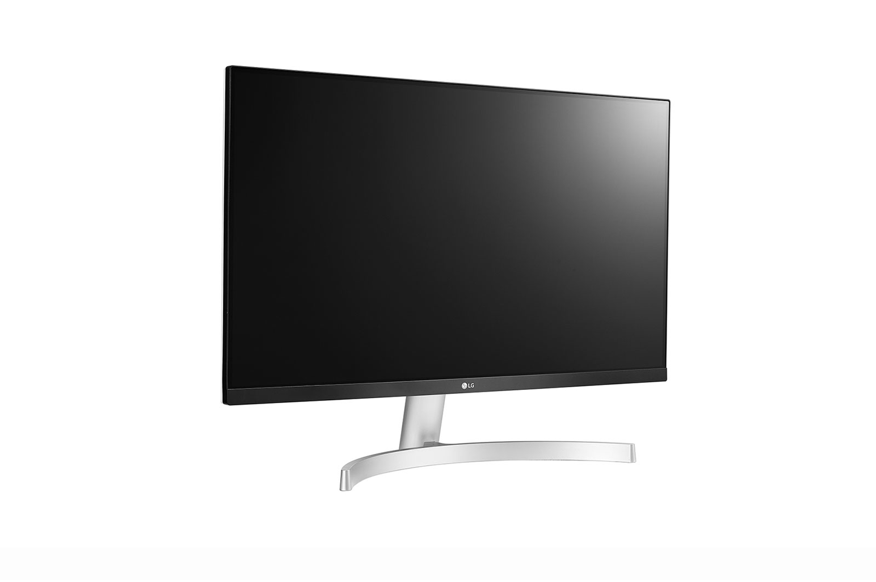 A silver and black computer monitor on a white surface. The screen is black.