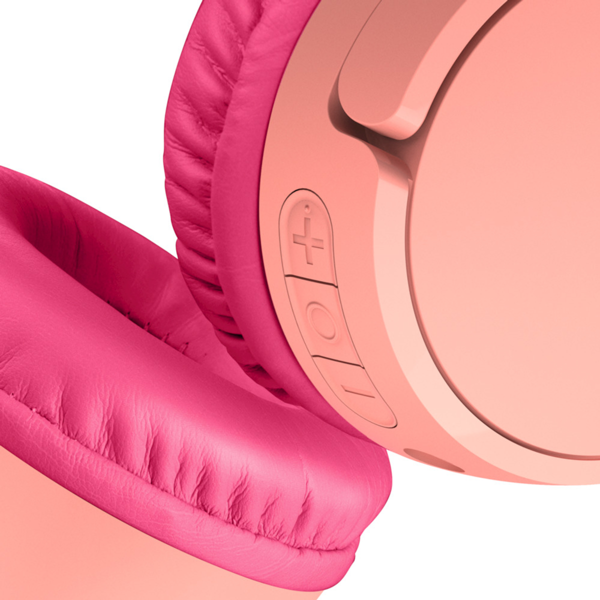 Primo piano di cuffie rosa con pulsanti. I padiglioni sono rosa e i pulsanti visibili.