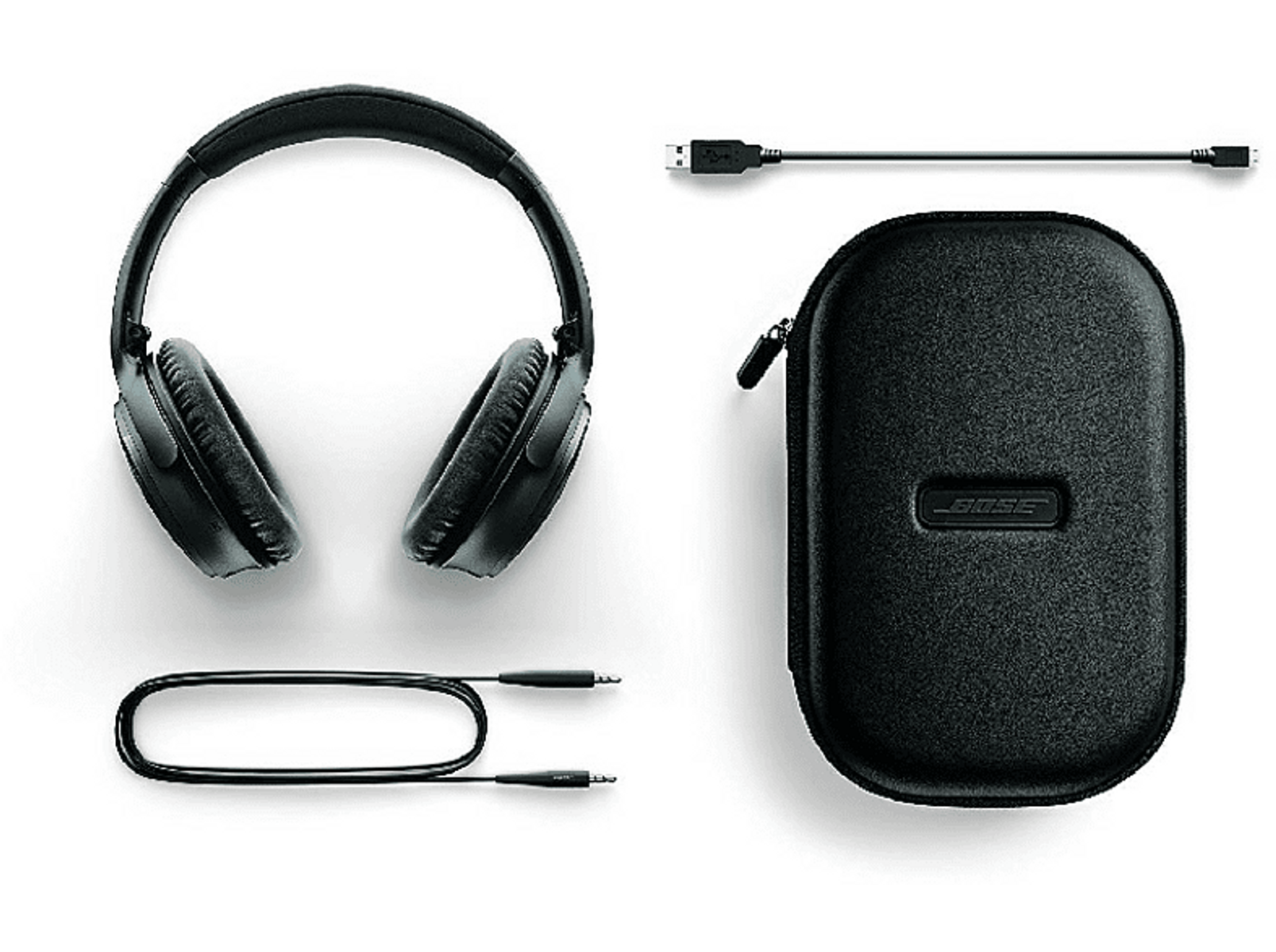 Schwarze Bose-Kopfhörer mit Etui, USB- und Audiokabeln, auf weißem Hintergrund.