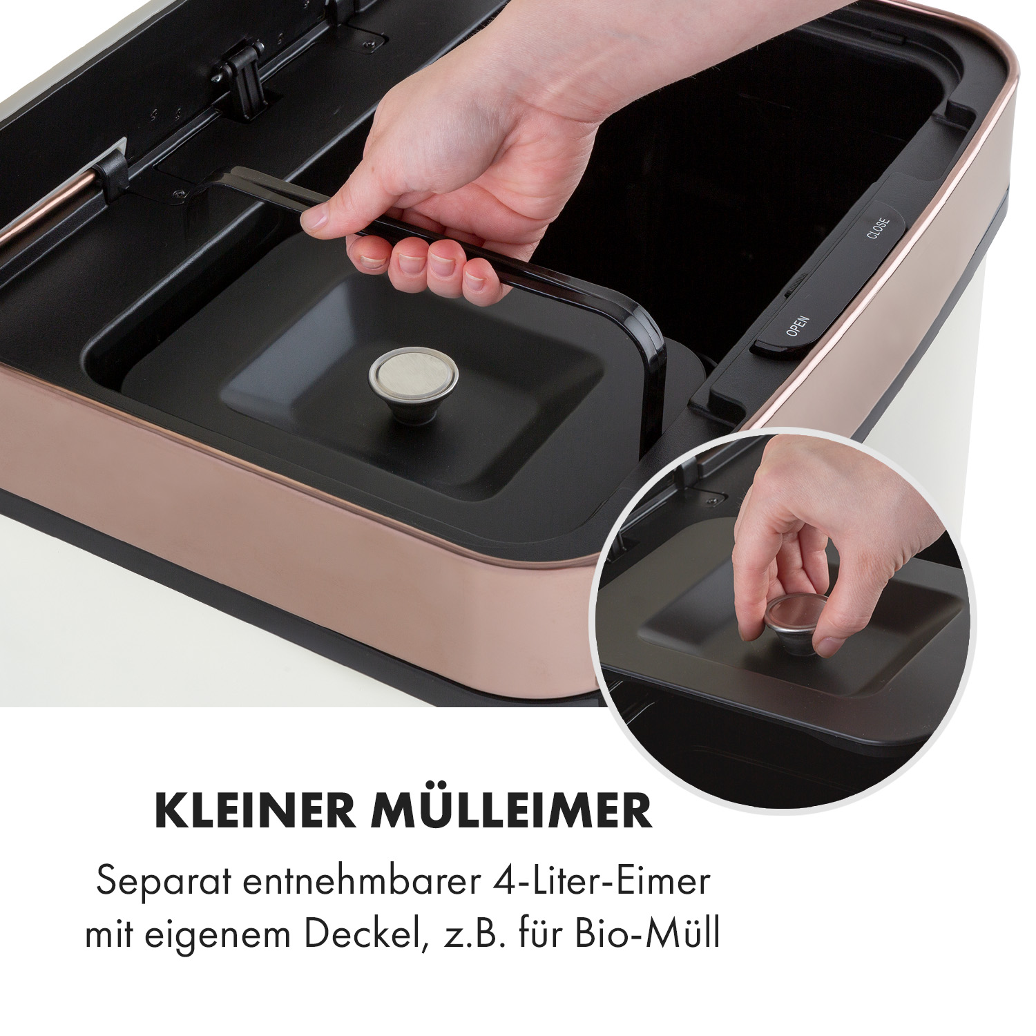 Ein Mülleimer mit herausnehmbarem schwarzem Behälter und roségoldfarbenem Rand.