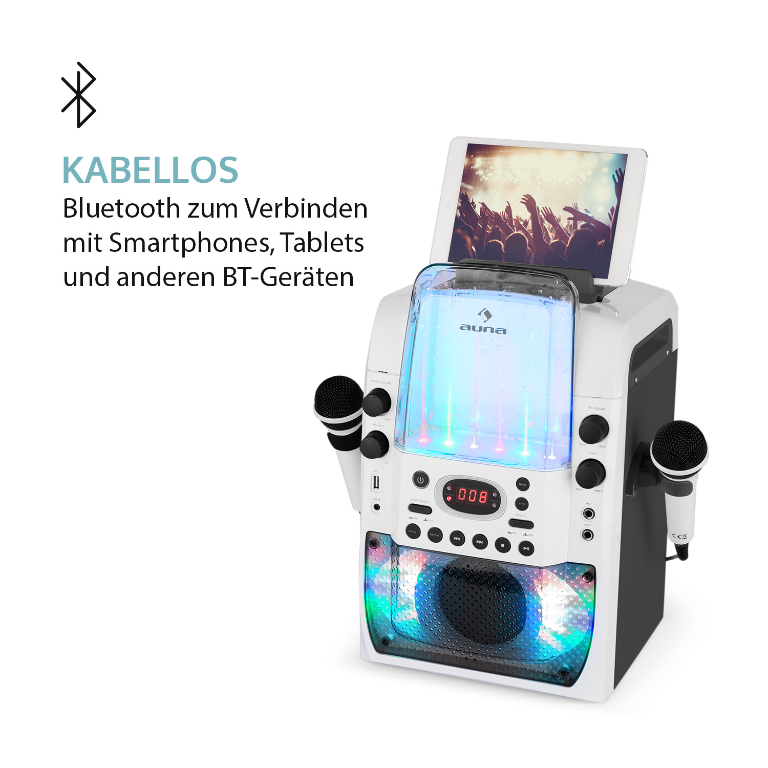 Eine weiße Karaoke-Maschine mit bunten Lichtern, einem Tablet und zwei Mikrofonen.