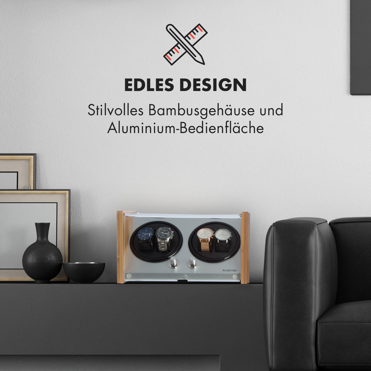 Ein Uhrenbeweger mit Uhren, auf einer schwarzen Oberfläche mit Ledersofa und Vase.