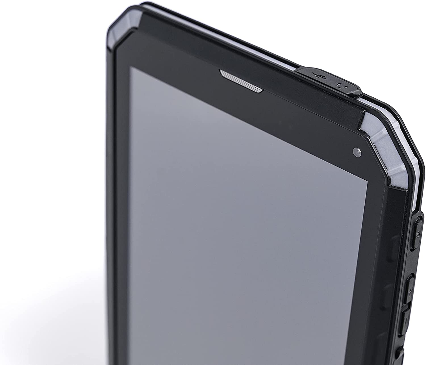Nahaufnahme einer schwarzen Tablet-Ecke. Es hat einen Bildschirm, Knöpfe und einen USB-Anschluss.