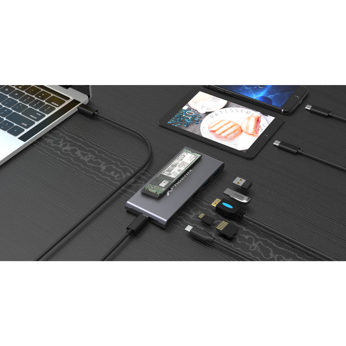 Un concentrador de escritorio negro con cables conectados a una computadora portátil, tableta y otros dispositivos.
