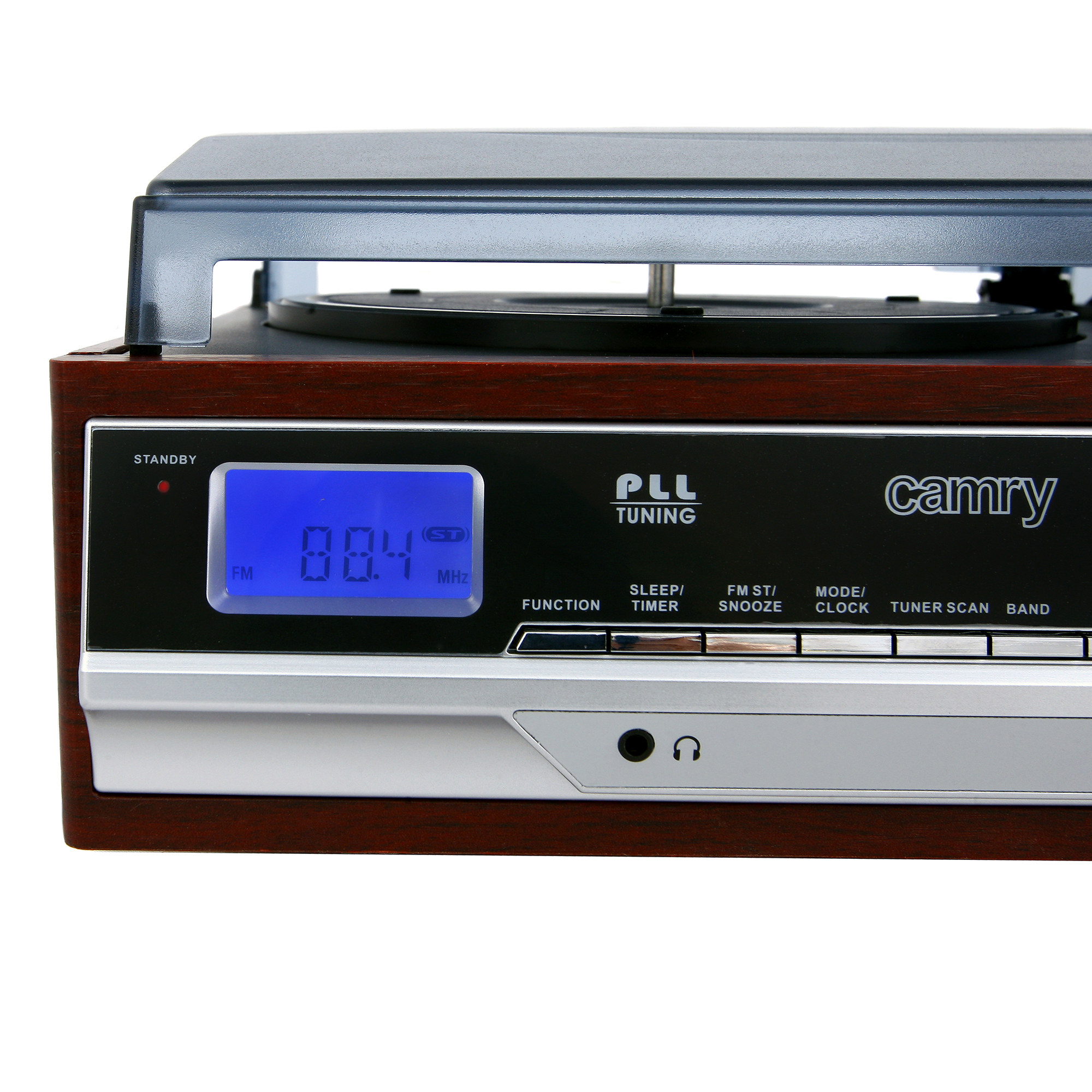 Primer plano de un tocadiscos vintage con una pantalla digital que muestra la frecuencia y la configuración.