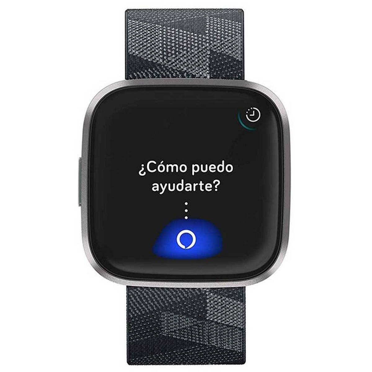 Smartwatch con texto en español, correa negra. Círculo azul con signo de interrogación.