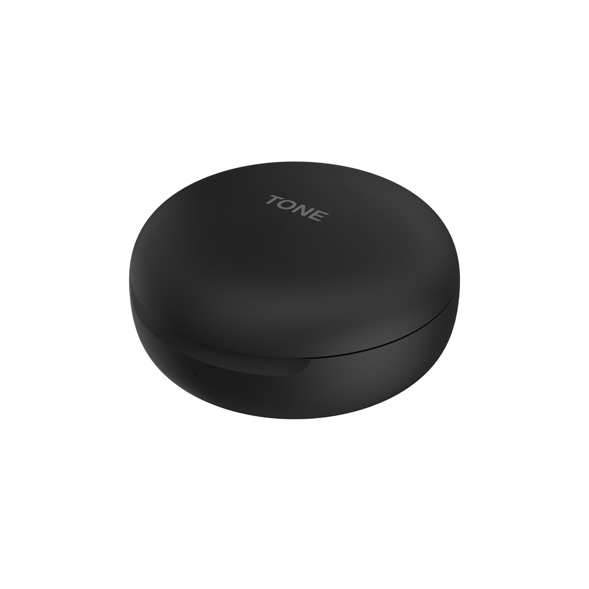 Czarny, okrągły futerał ładujący słuchawek LG Tone na białej powierzchni.