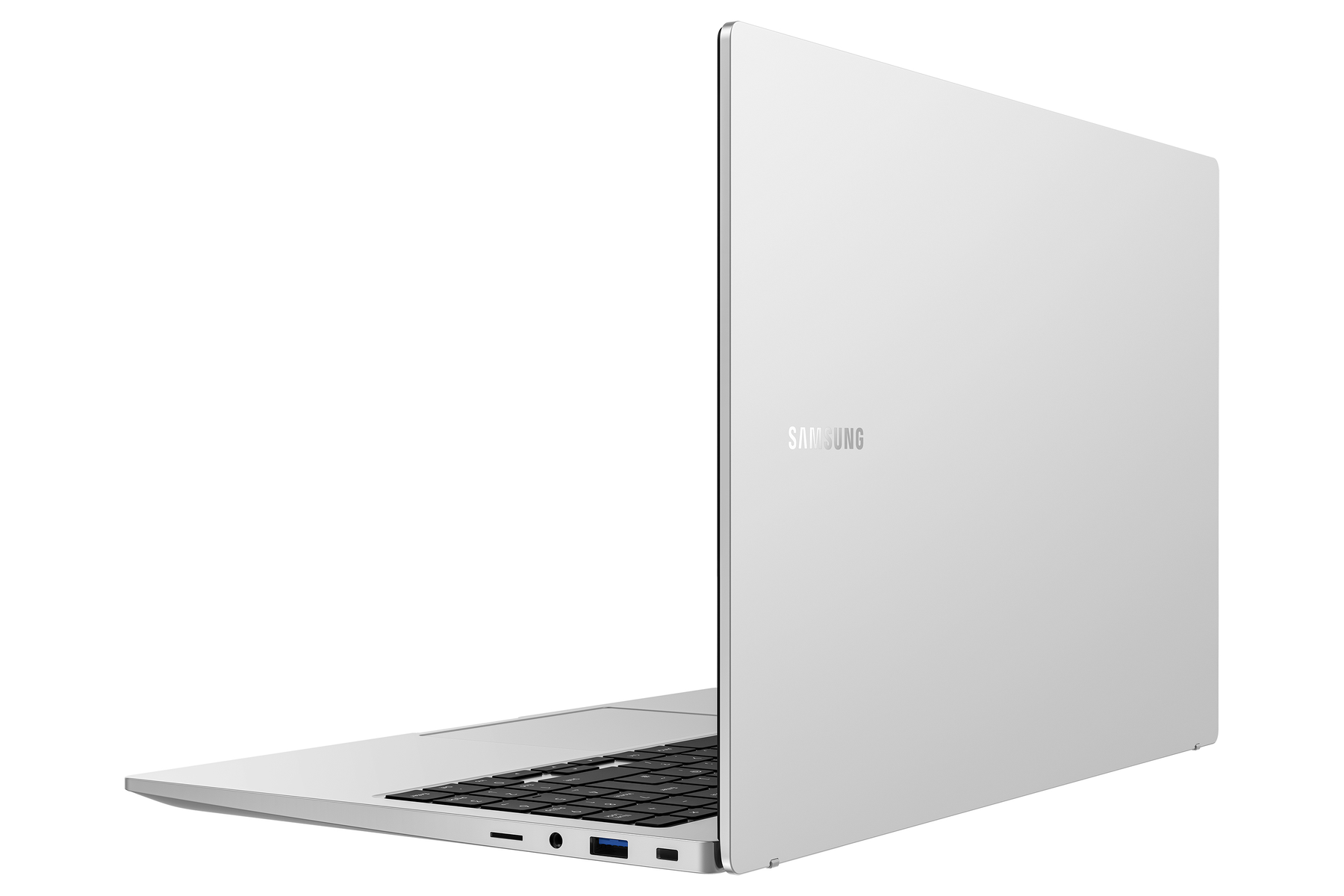 Srebrny laptop Samsung z perspektywy. Widoczne logo Samsung. Białe tło.