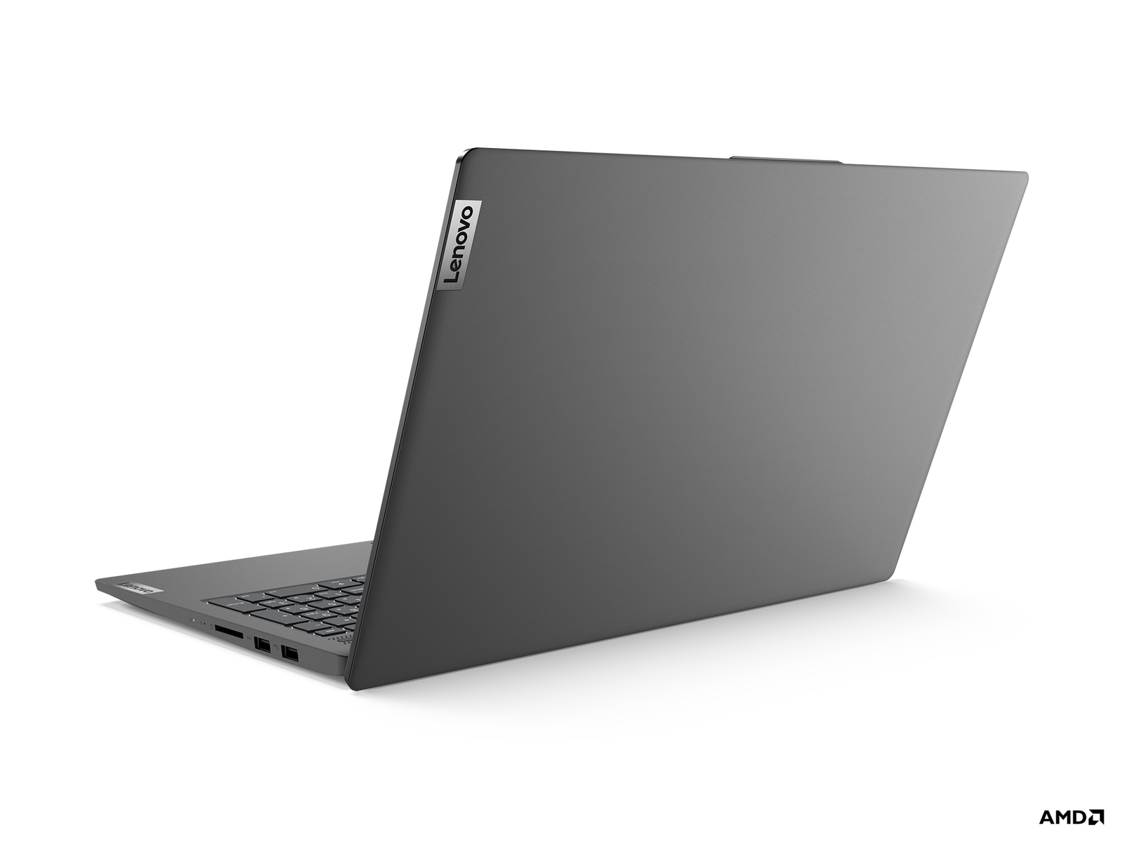 Tył szarego laptopa Lenovo pod kątem, z widocznym logo Lenovo i logo AMD.