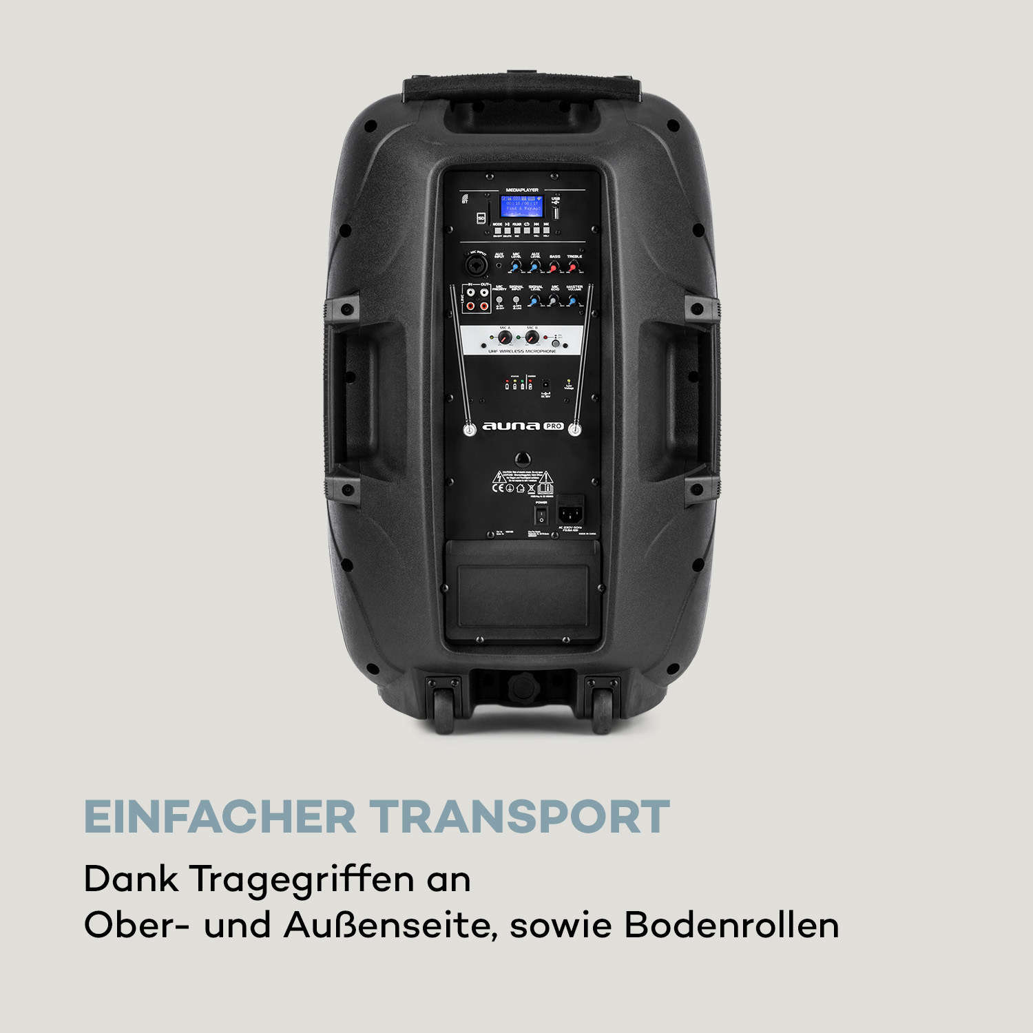 Ein schwarzer Lautsprecher mit Bedienfeld und Rädern, mit den Worten 'EINFACHER TRANSPORT'.