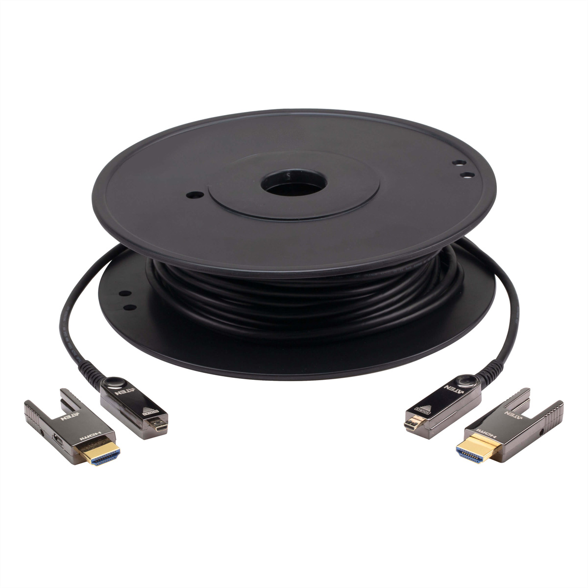 Eine schwarze Kabeltrommel mit HDMI-Kabeln. Zwei Kabel sind angeschlossen, zwei getrennt. Weißer Hintergrund.