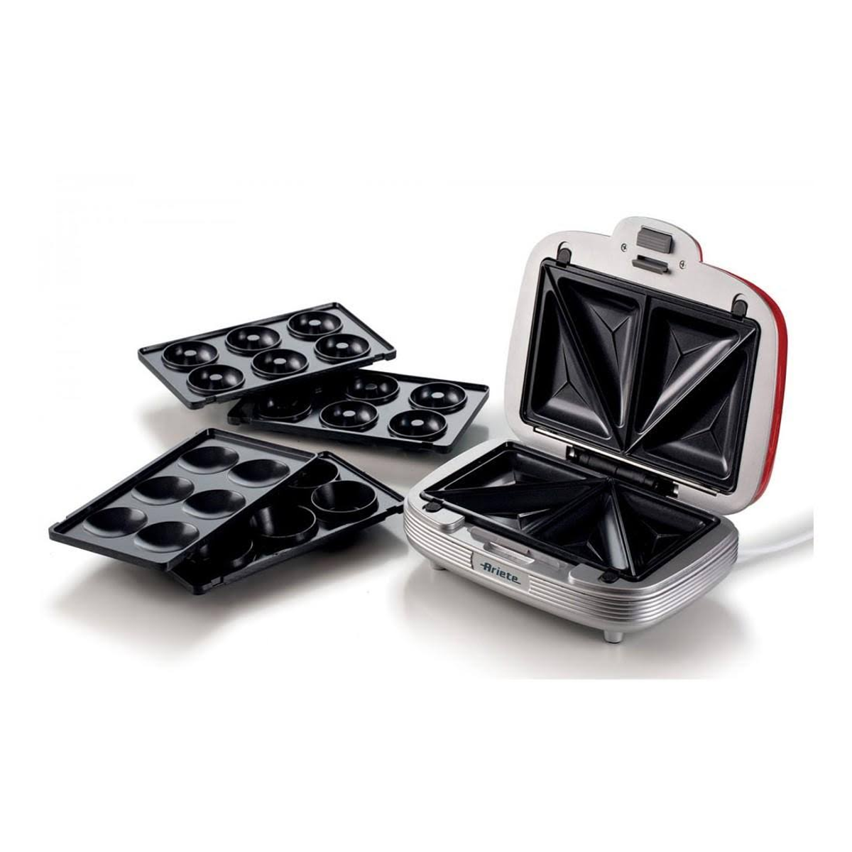Sandwich maker with interchangeable plates for donuts and muffins. White and red exterior. Angled view.