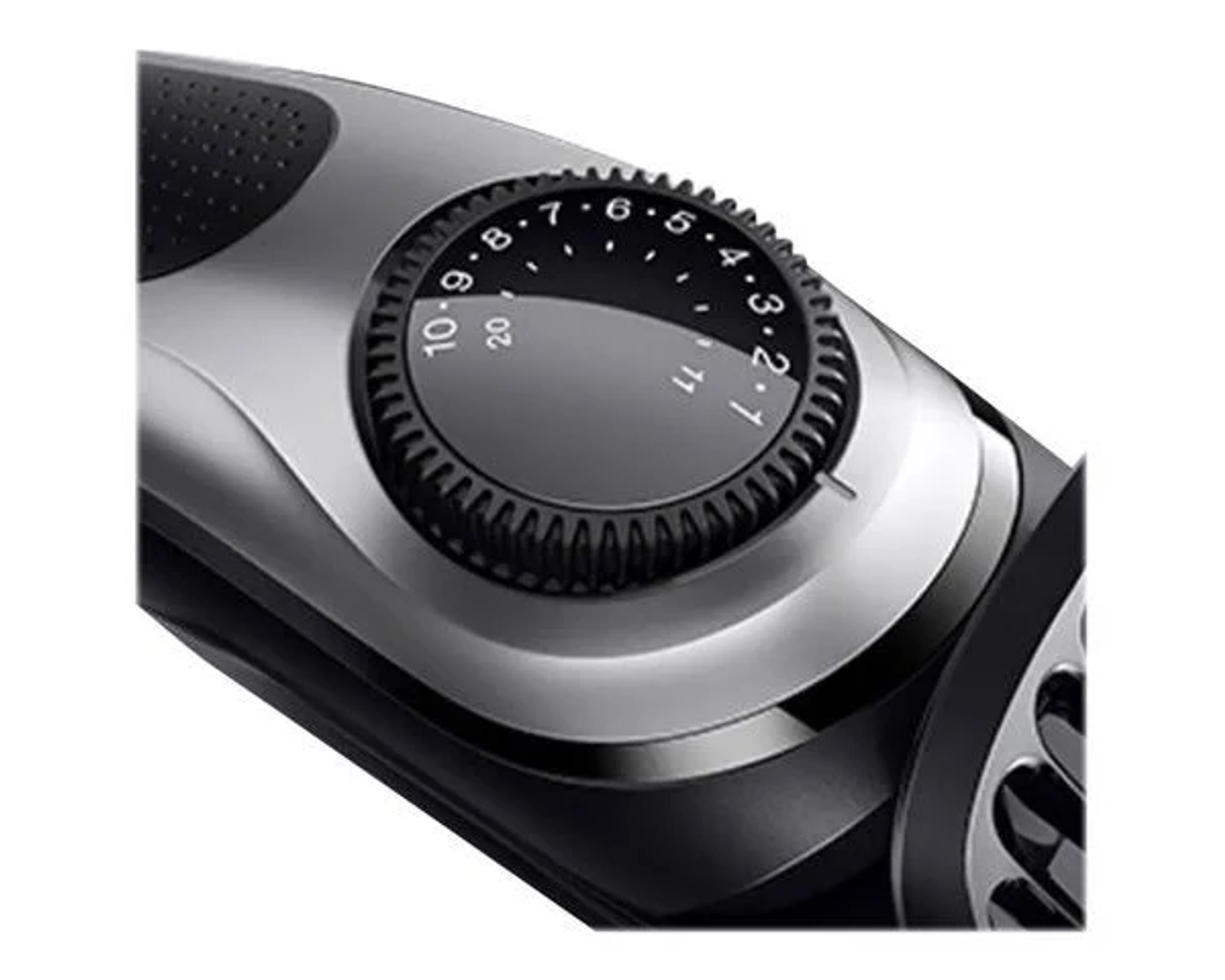 A close-up of a black and silver adjustable hair clipper dial with numbers 1-10 and 20.