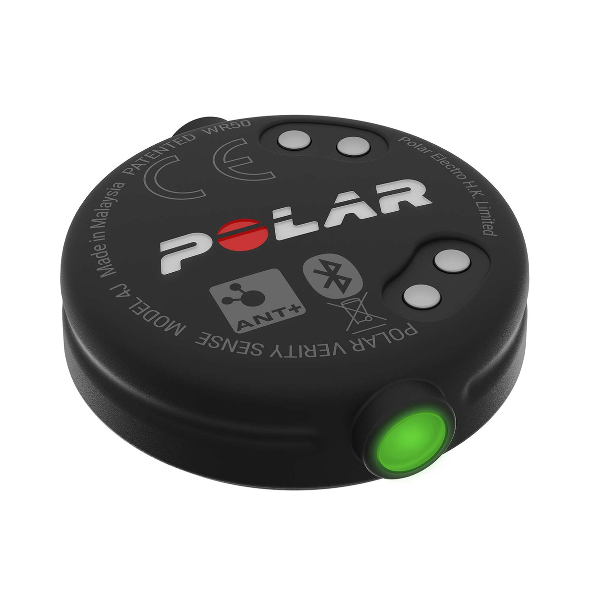 Dispositivo Polar Verity Sense negro con una luz verde. El dispositivo está sobre una superficie blanca.