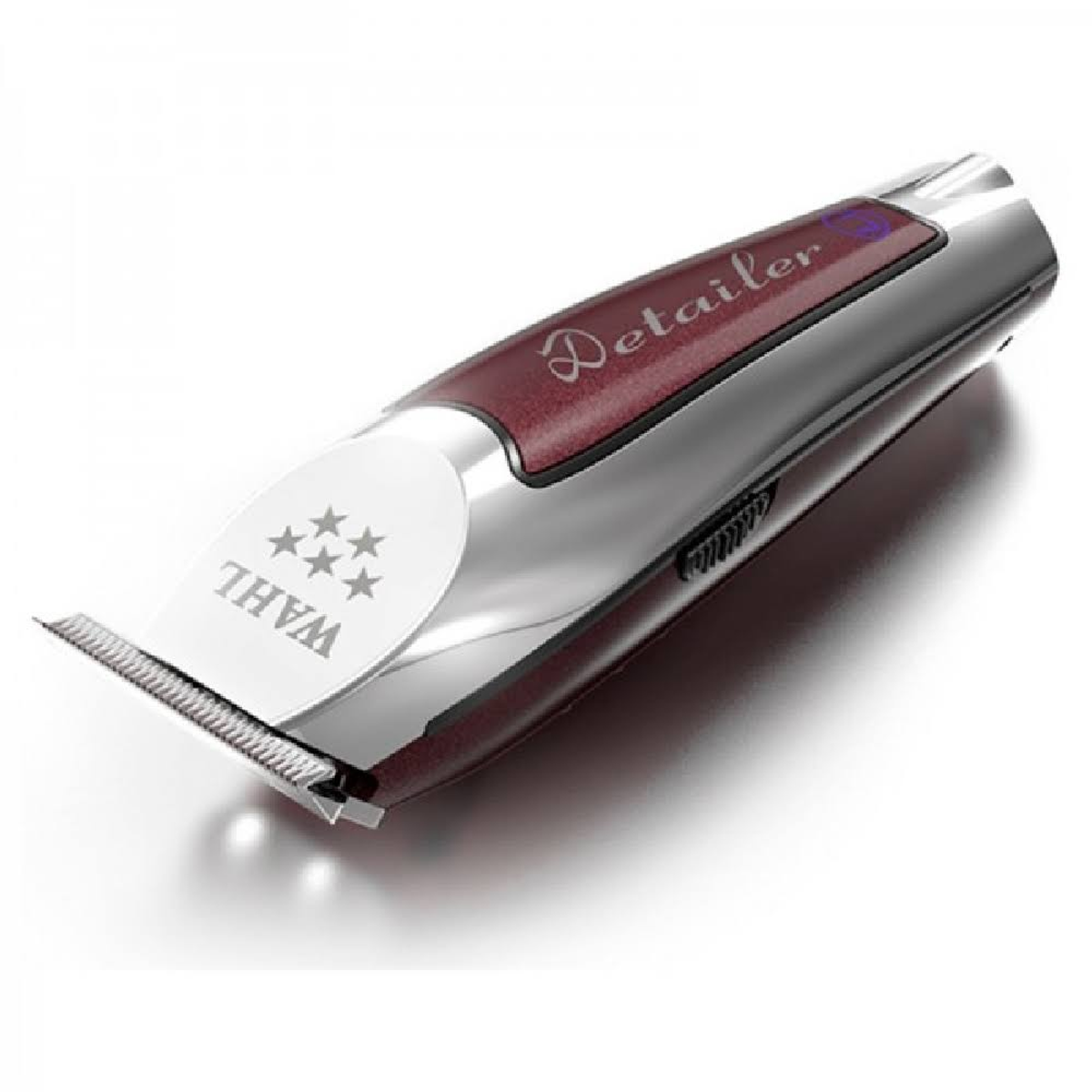 Un tagliacapelli Wahl Detailer in argento e bordeaux, angolato su una superficie bianca.