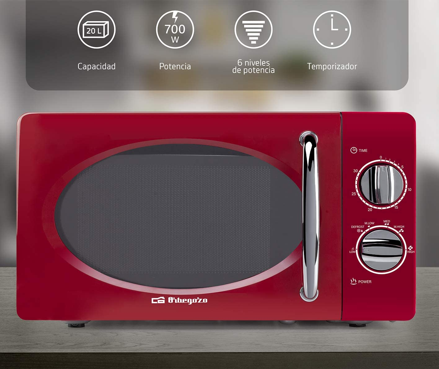 Czerwona kuchenka mikrofalowa z czarnymi drzwiami, panel sterowania i etykiety graficzne.