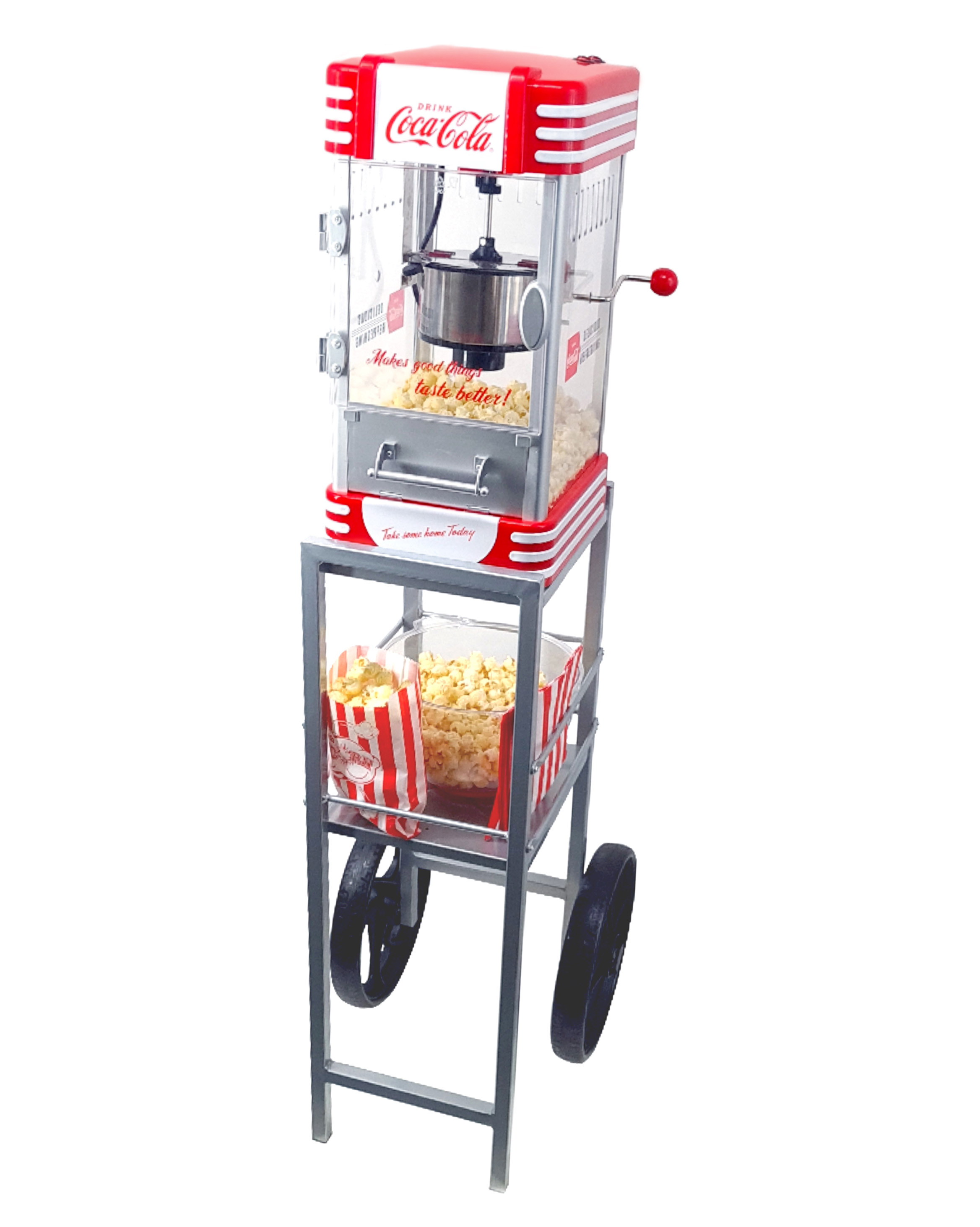 Rote Coca-Cola Popcornmaschine mit Popcorn. Ein Wagen hält Popcorntüten.