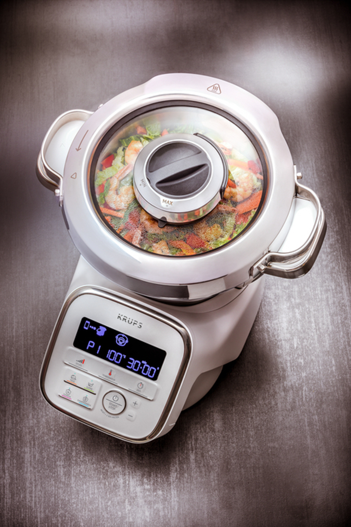 Weißer und silberner Food Processor mit Glasdeckel und Bedienelementen.