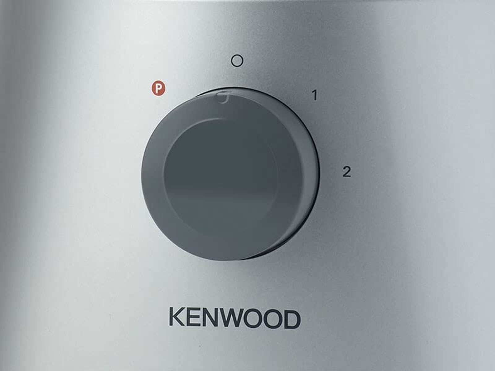 Primo piano della manopola di controllo di un elettrodomestico Kenwood, contrassegnata da 'P', '0', '1' e '2'.