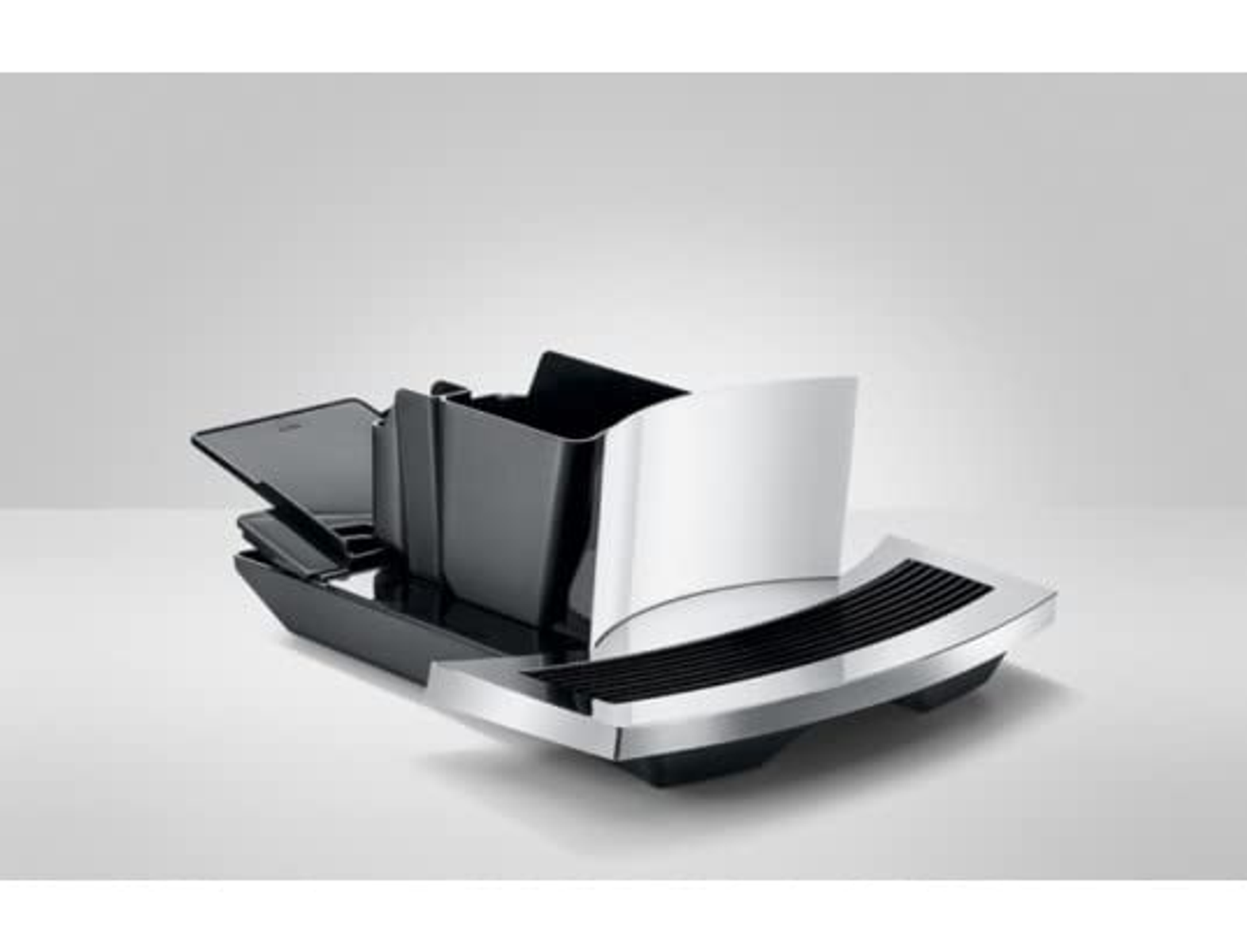 Części ekspresu do kawy na białym tle. Kolory czarny i srebrny. Czysty design.