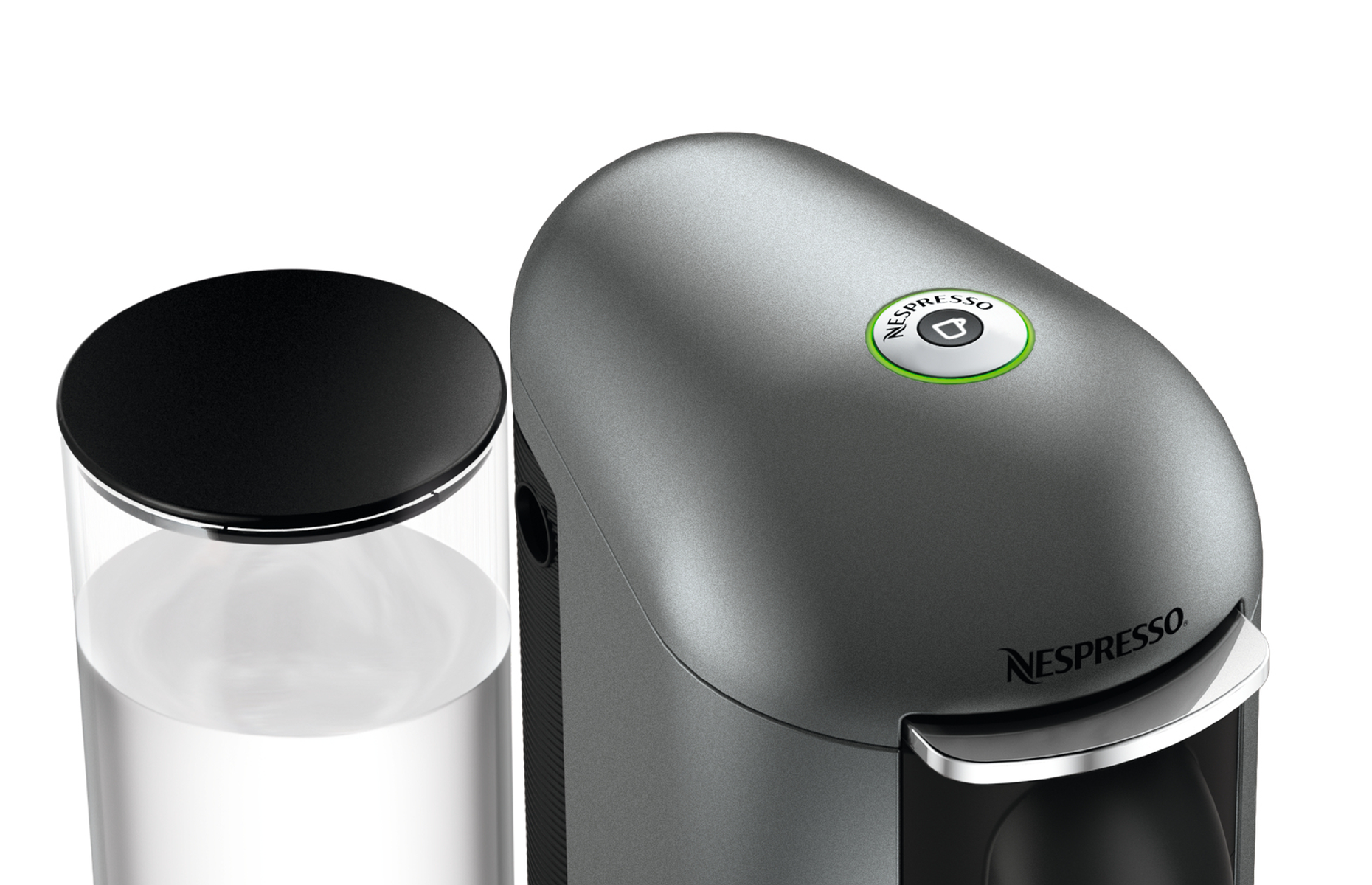 Nespresso-Kaffeemaschine und Wasserbehälter. Graue Maschine und transparenter Behälter. Weißer Hintergrund.