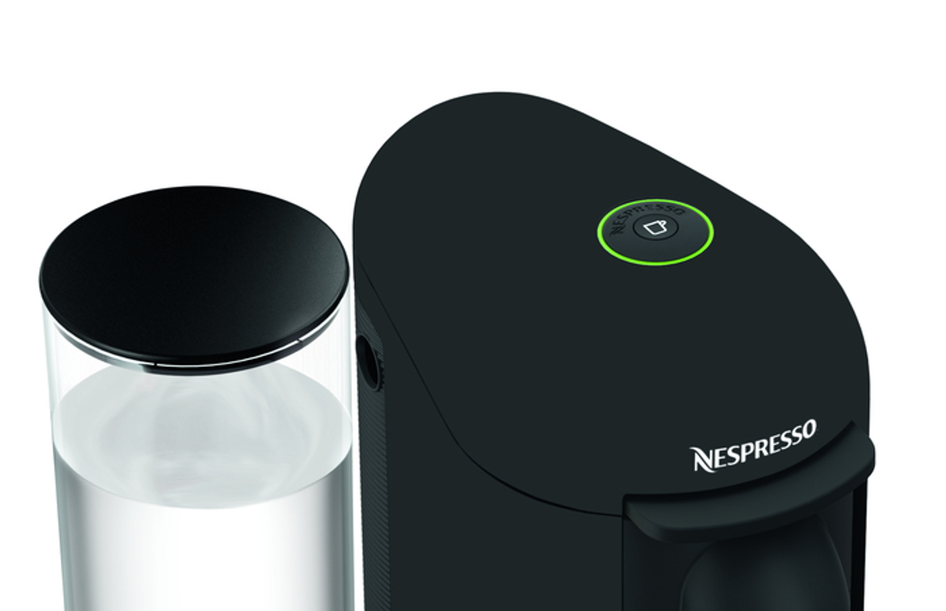 Cafetera Nespresso negra, con depósito agua a la izquierda y botón verde.