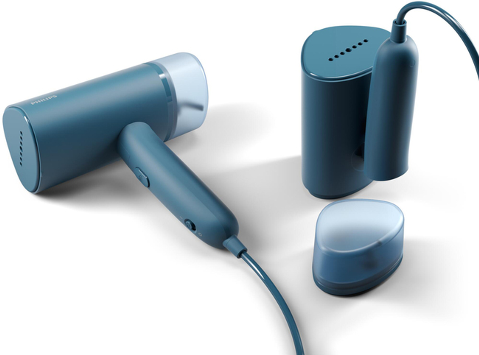 Juego de vaporizador de ropa Philips color turquesa, que incluye el vaporizador, una base y un accesorio pequeño.