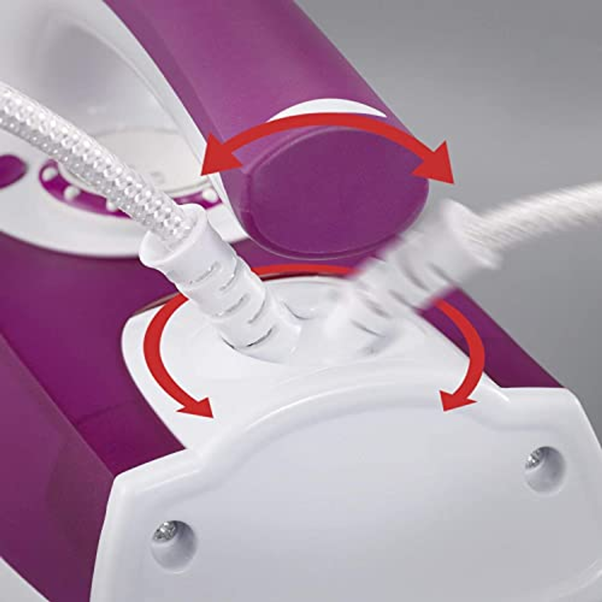 Close-up of iron with purple detail. Arrows indicate the direction of movement.
