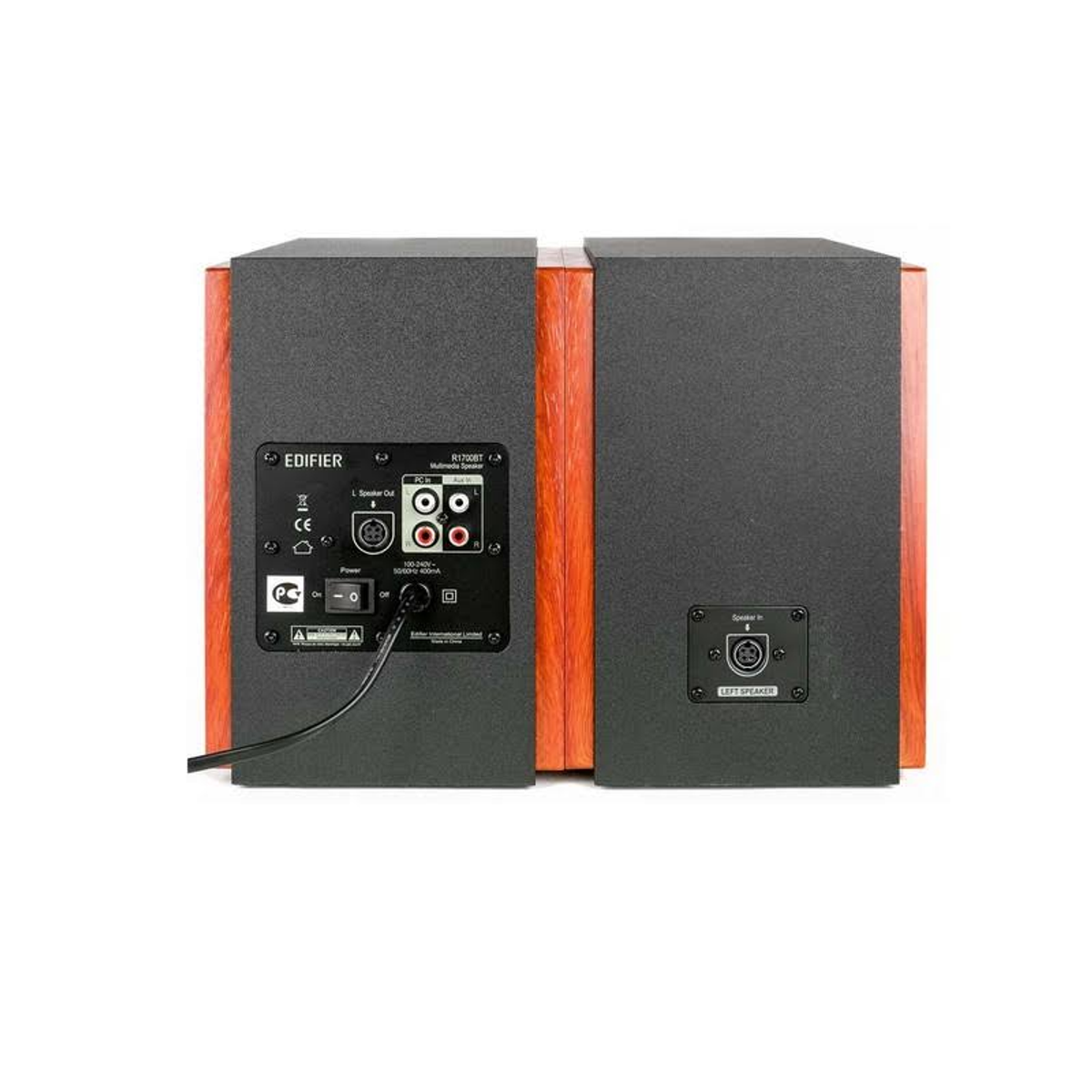 Tył dwóch drewnianych głośników, z widocznymi portami i połączeniami.