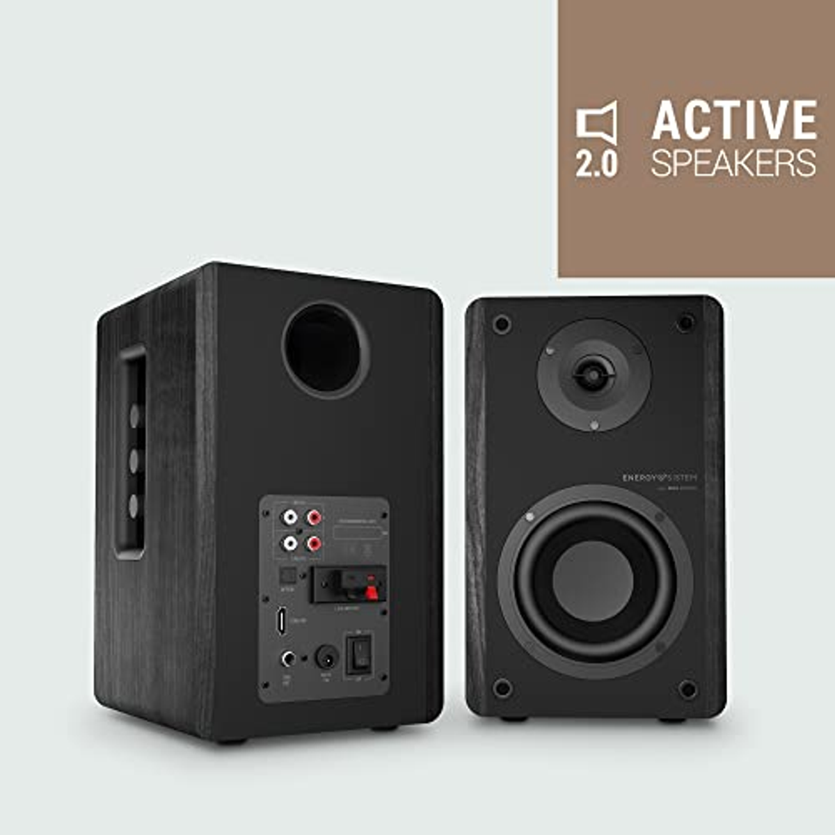 Altavoces negros. Uno muestra el panel trasero. El otro el panel frontal.