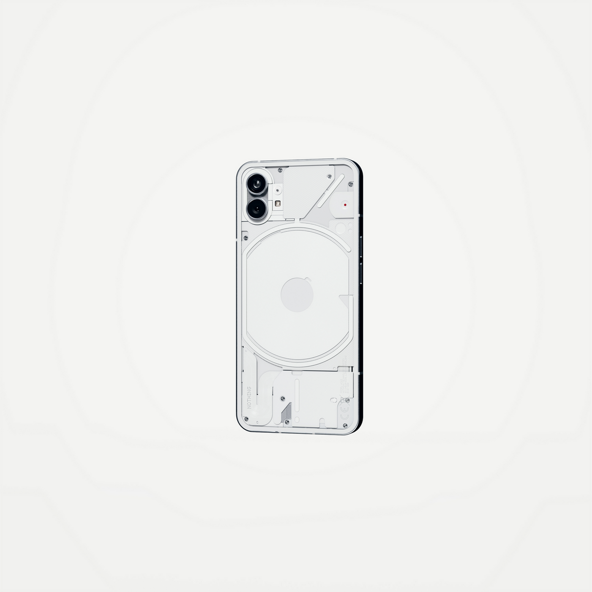 Tył białego telefonu z dwoma aparatami, okrągłym wzorem i logo Nothing.
