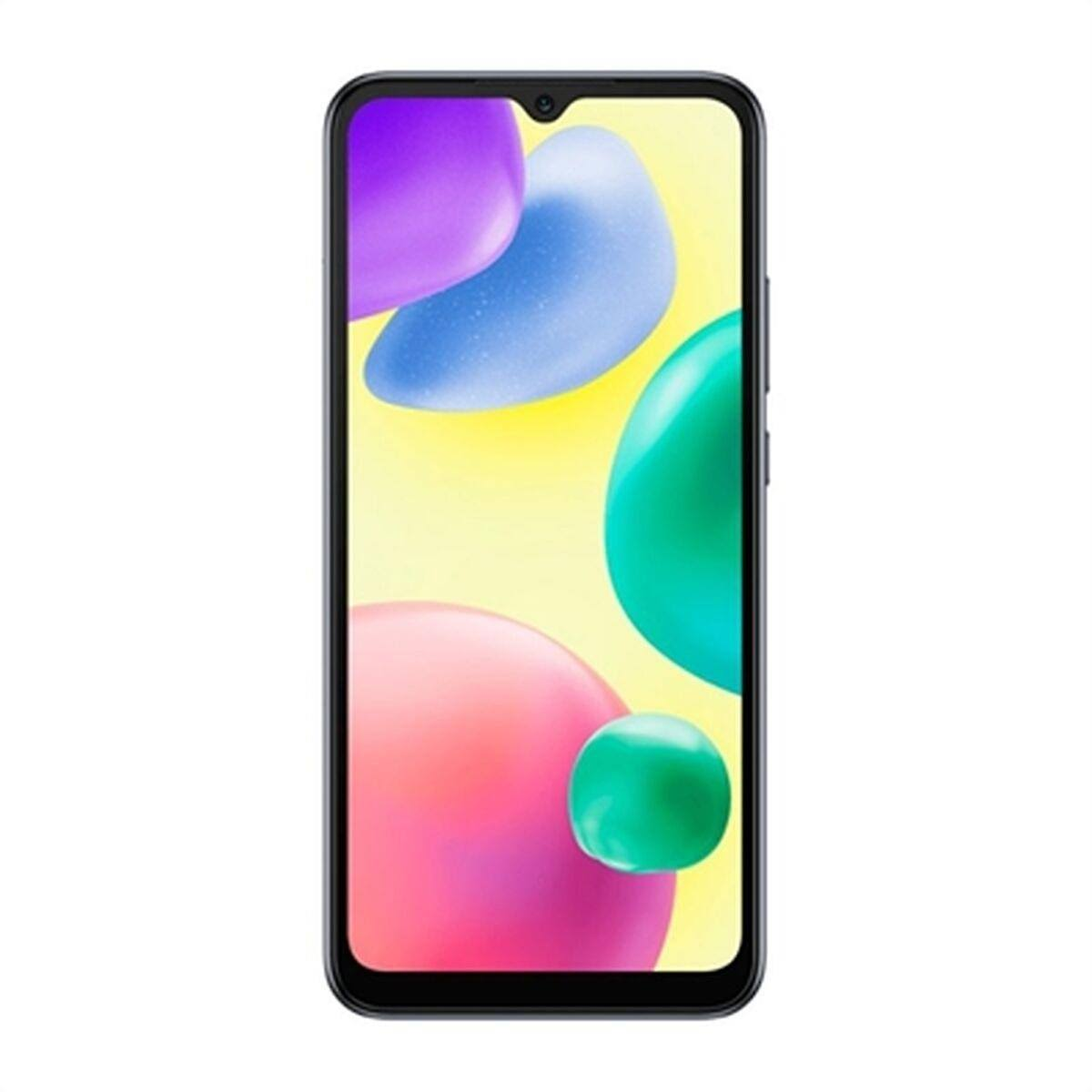 Ein schwarzes Telefon, das ein farbenfrohes Display mit Kugeln und Formen zeigt.