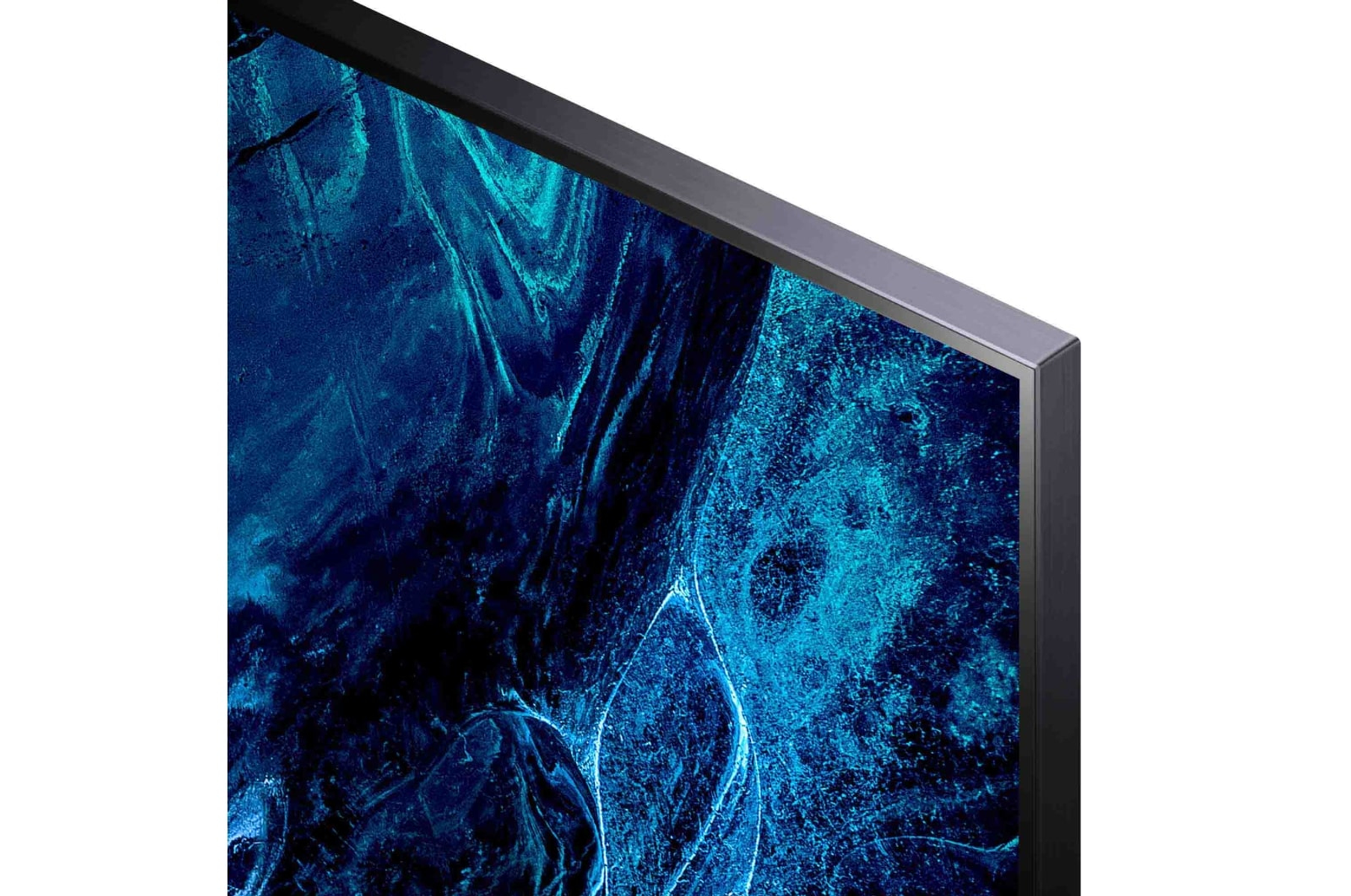 Primer plano de una esquina de pantalla de TV, mostrando un patrón abstracto azul y negro.