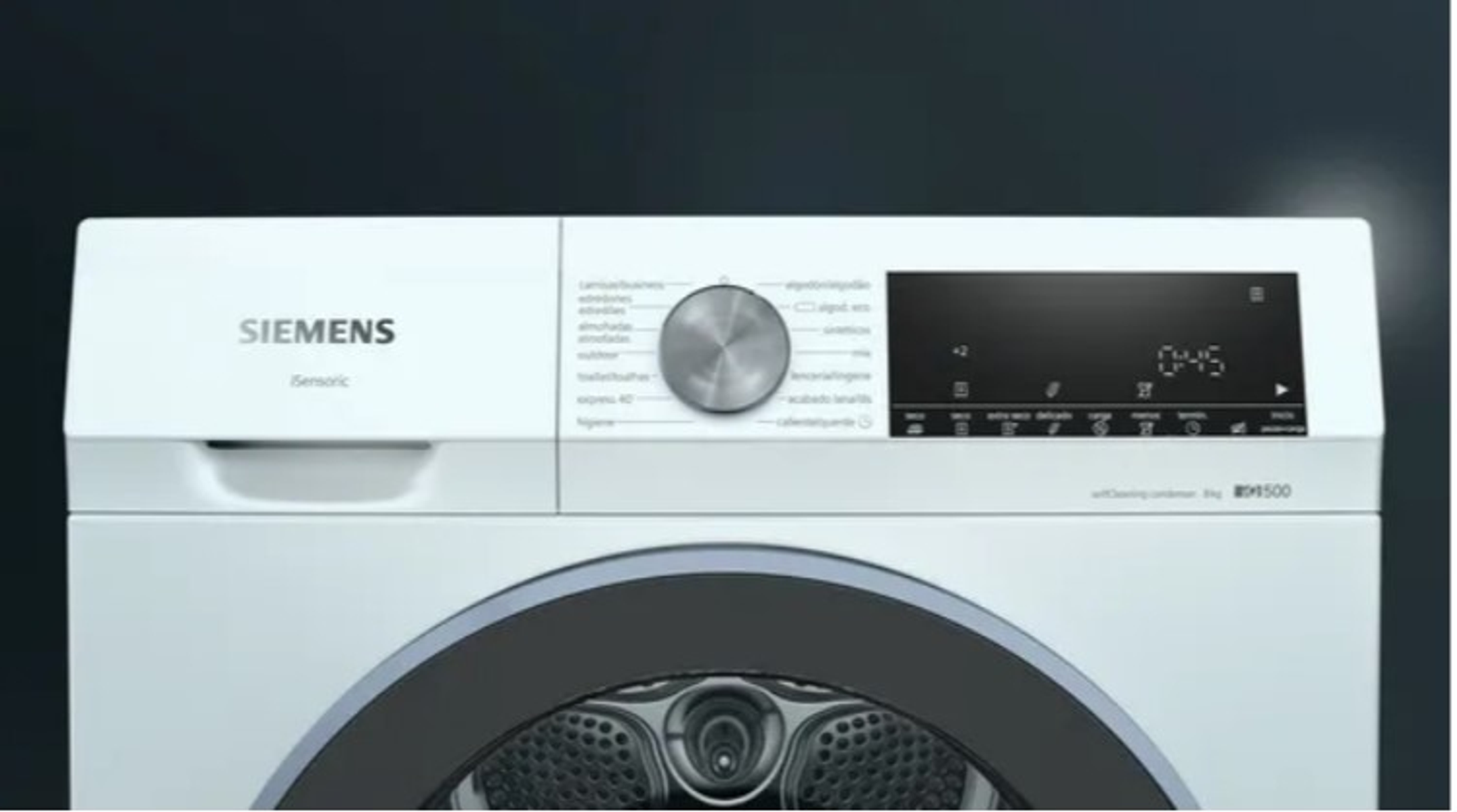 Panel de control de lavadora Siemens blanca. Pantallas y dial visibles.
