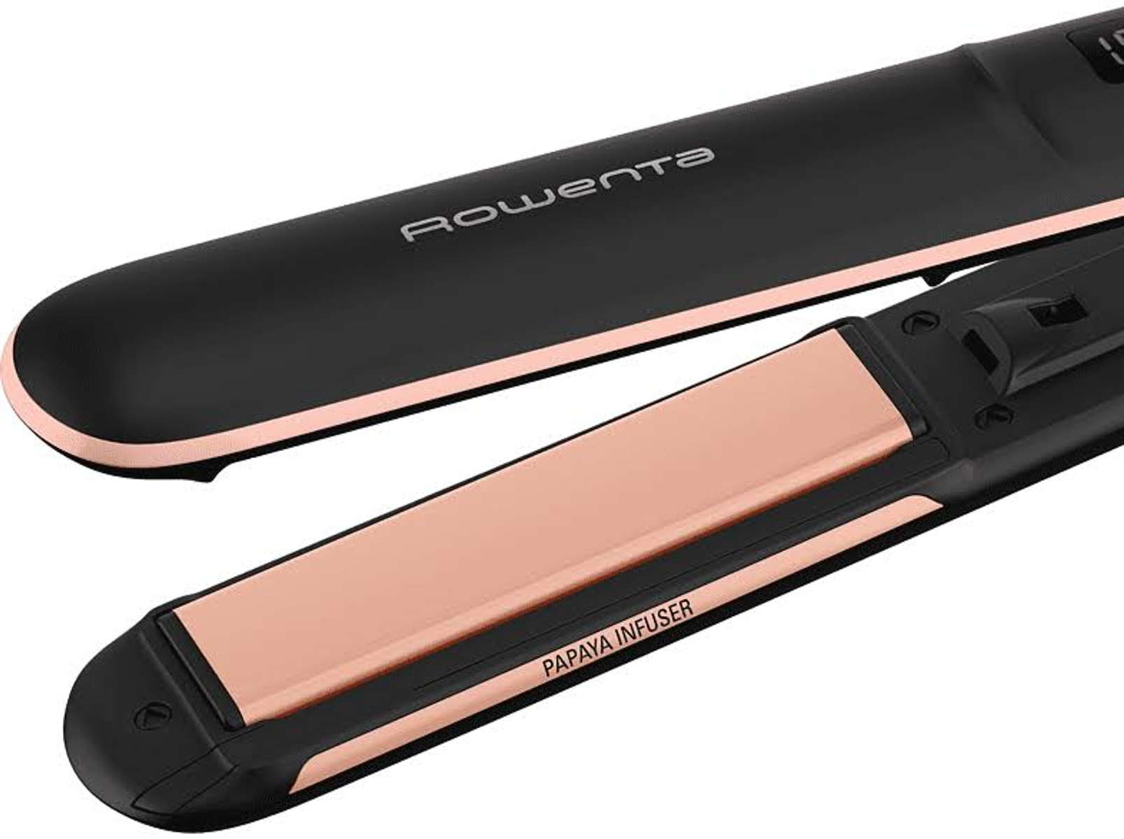 Plancha de pelo, negro y oro rosa. Abierta, placas visibles. Infusor de papaya. Fondo blanco.