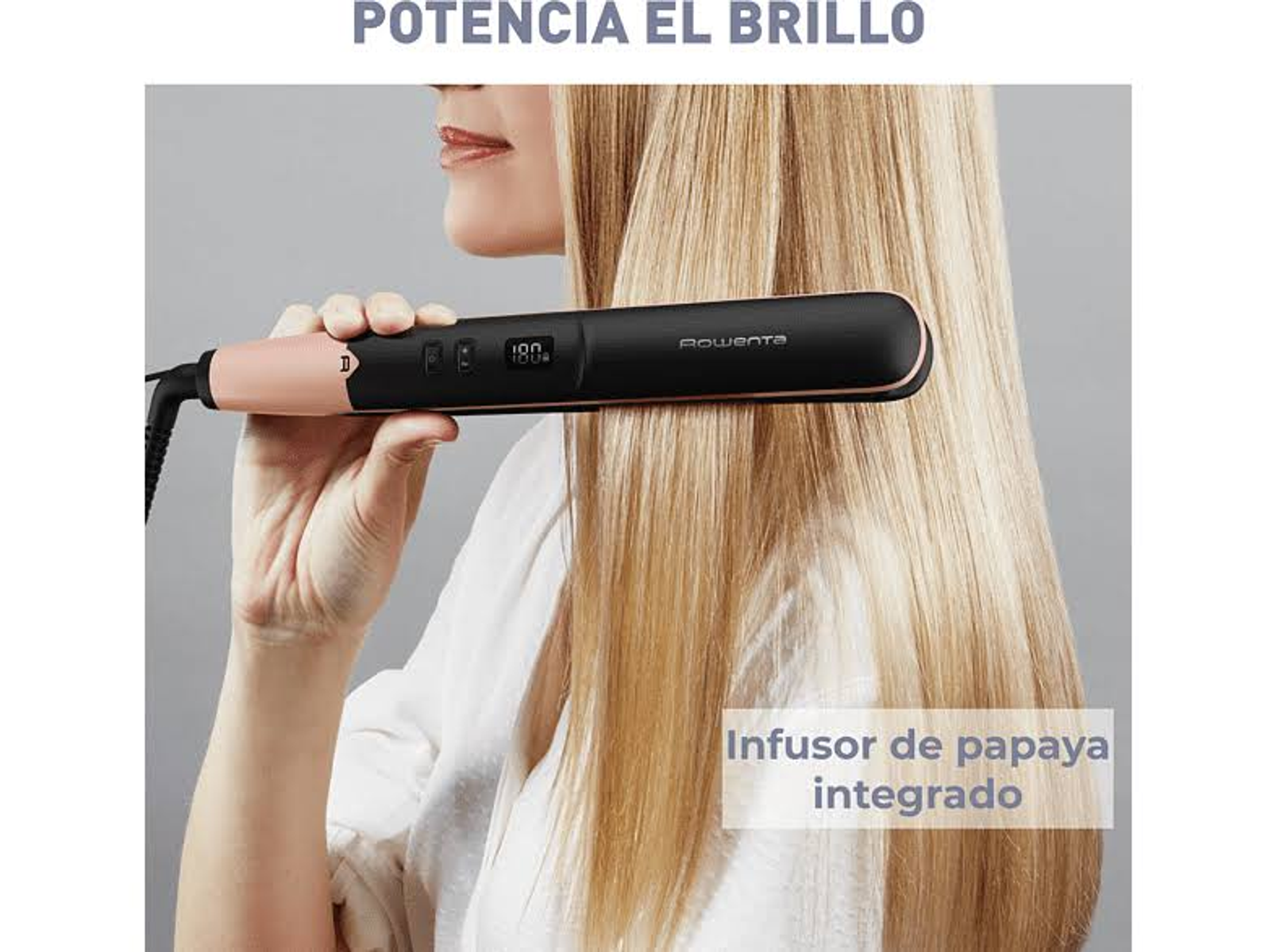 Mujer usando una plancha de pelo negra y oro rosa en cabello rubio largo, con función de infusión de papaya.