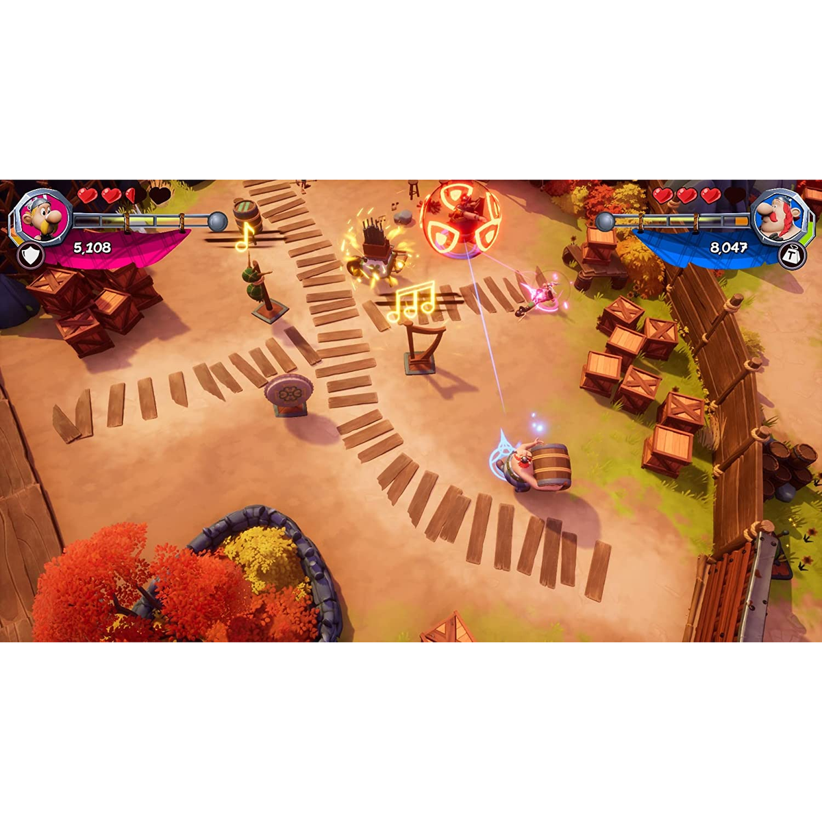 Escena de juego con personajes, notas musicales y cajas de madera. Dos personajes luchan en la arena.