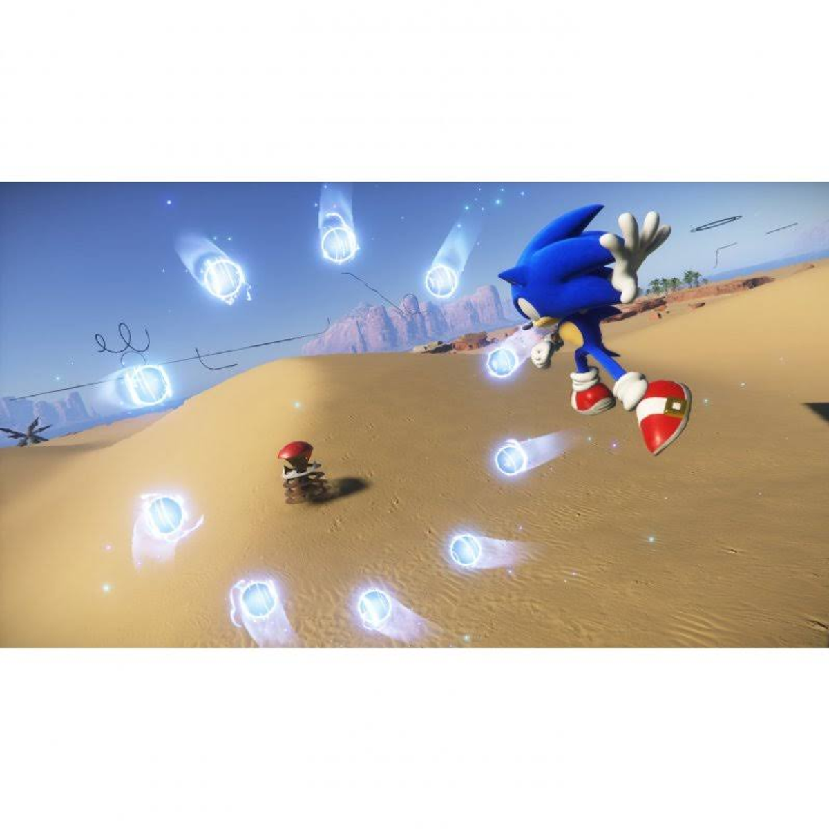 Sonic corriendo por un desierto con estelas de energía azul y una figura roja.
