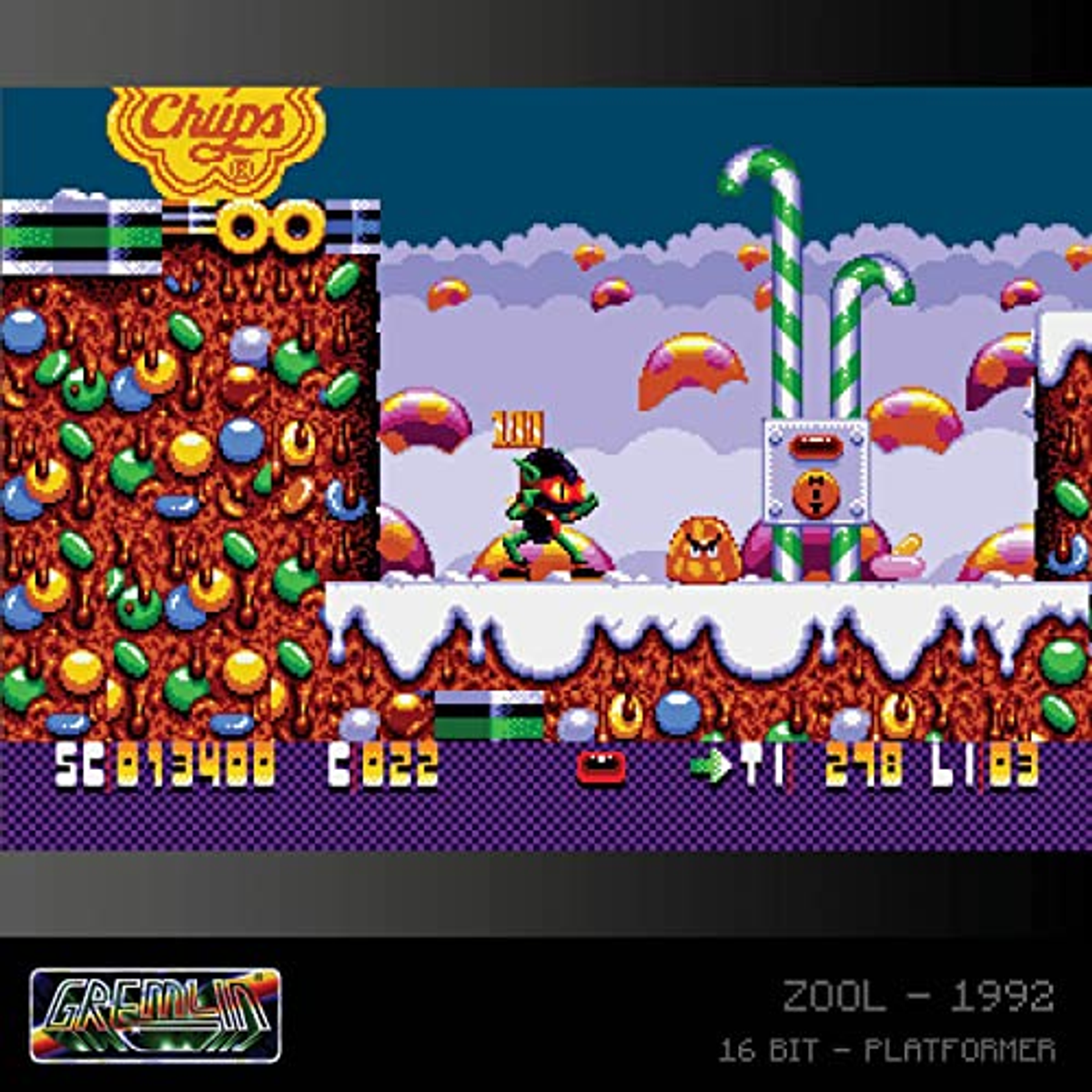 Scena z gry Zool. Zielone stworzenie, laski cukrowe, pływające wyspy i brązowa, lawopodobna ziemia.