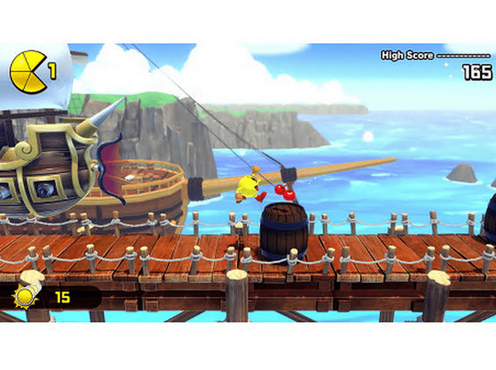 Postać Pac-Mana na mostku statku. Biega i skacze. Beczka i woda są w pobliżu.